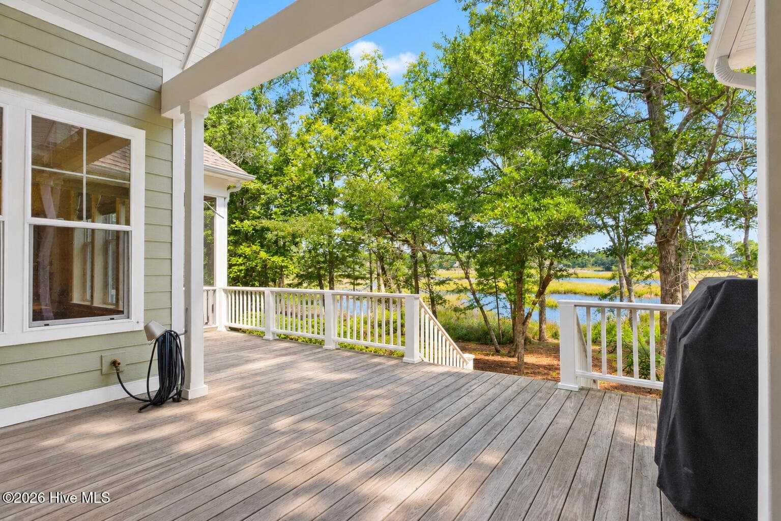 Deck overlooking the creek and marsh. - 5208 White Ibis Court, Southport, NC 28461, Southport