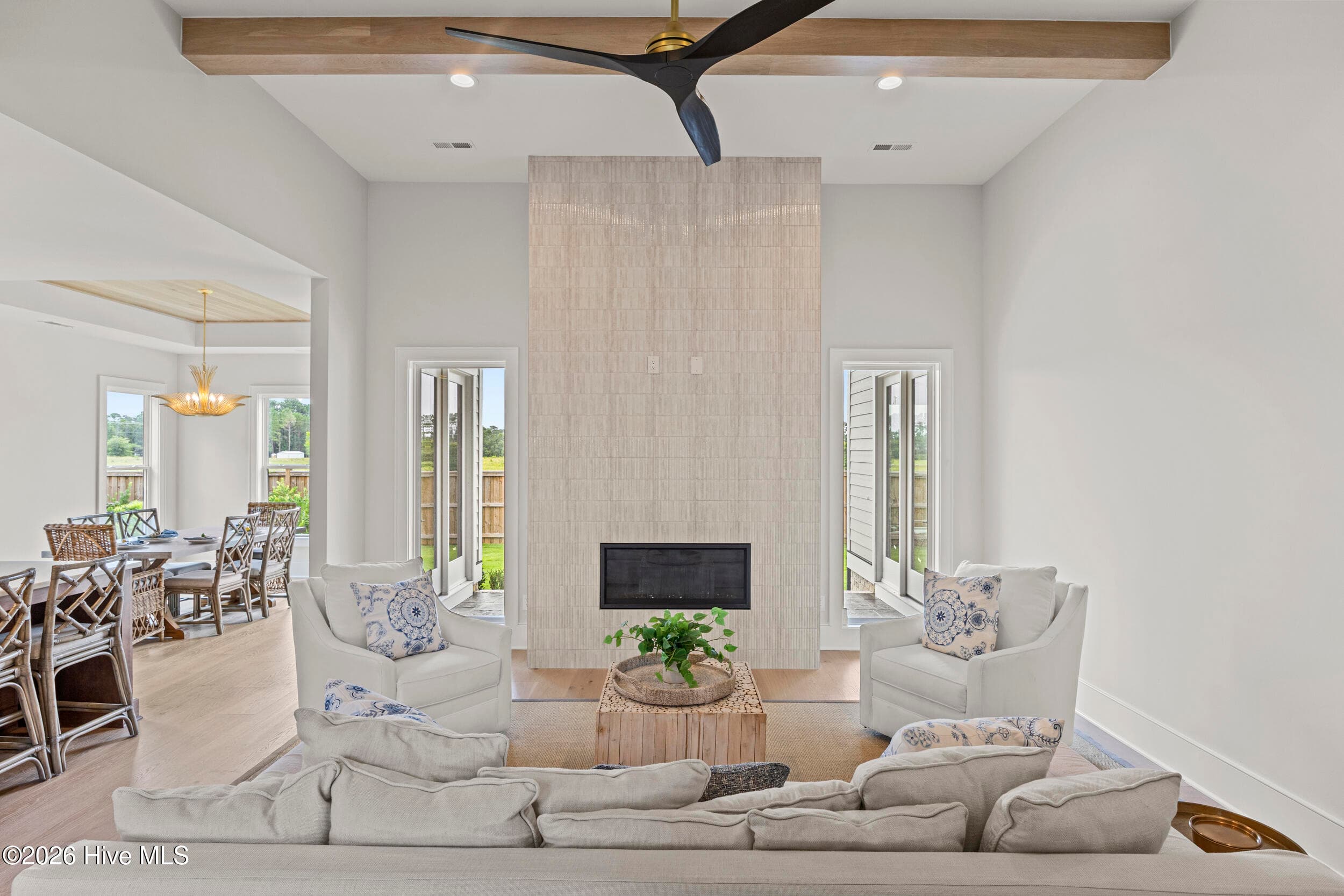 Living Room with custom beams and tile fireplace - 117 Grand Harvest Court, Wilmington, NC 28411