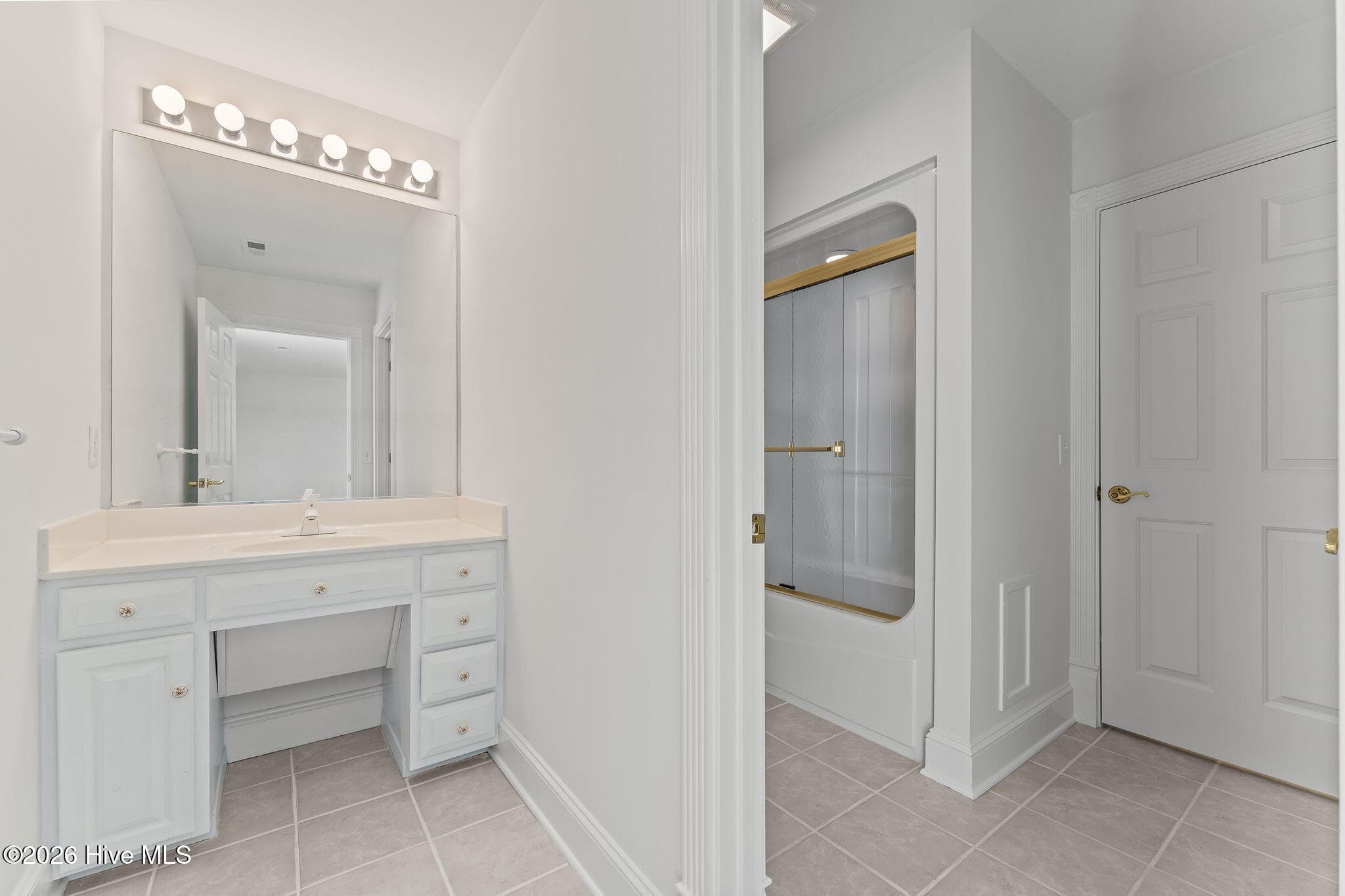 Upper bedroom #2 separate vanity. - 22 Lochmere Drive, Pinehurst, NC 28374