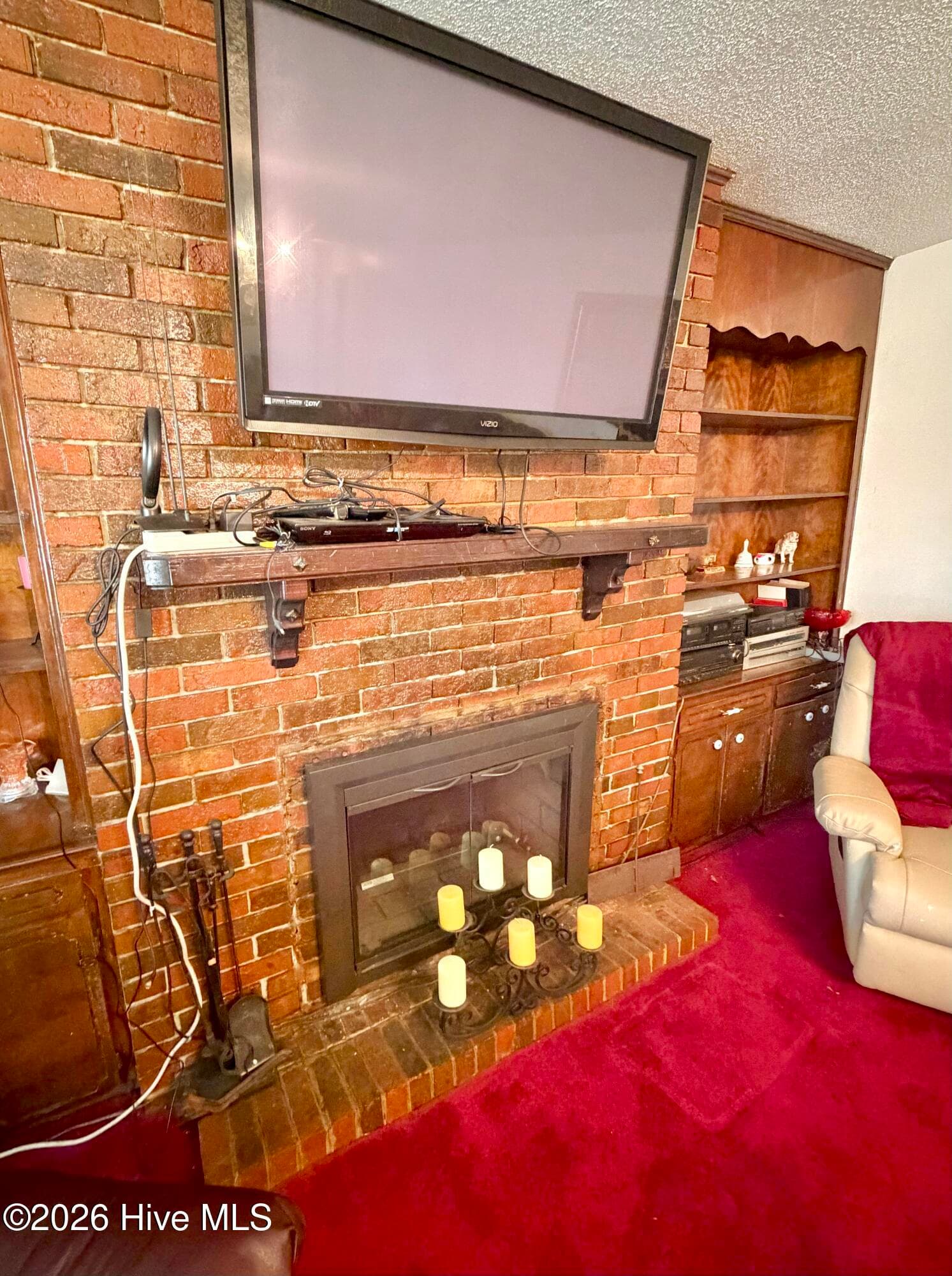 Living room fireplace - 5978 Hwy 258 S, Deep Run, NC 28525