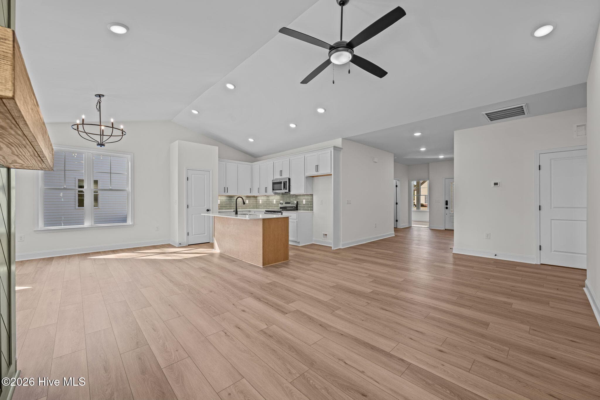 Open concept great room with cathedral ceiling - 1216 Petite Terre Court, New Bern, NC 28560
