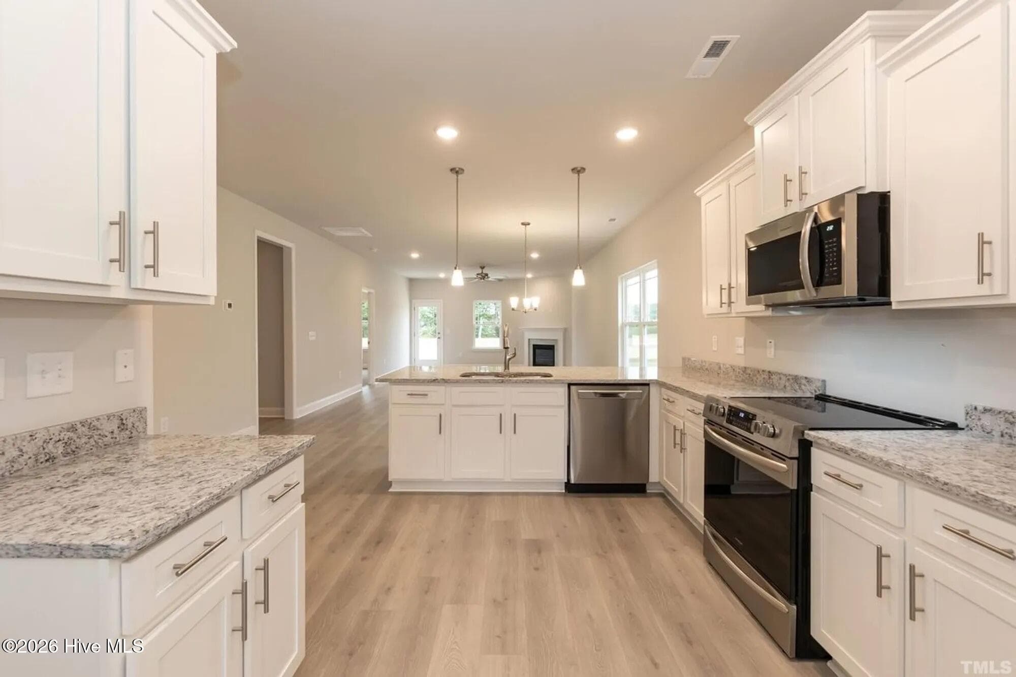 Only $1000 down and financial incentives offered with use of a preferred lender. Photos are of the same floor plan in a different community and are for layout purposes only. Upgrades, colors and finishes may differ. *This home is still under construction* - 3138 Firefly Trail, Grimesland, NC 27837