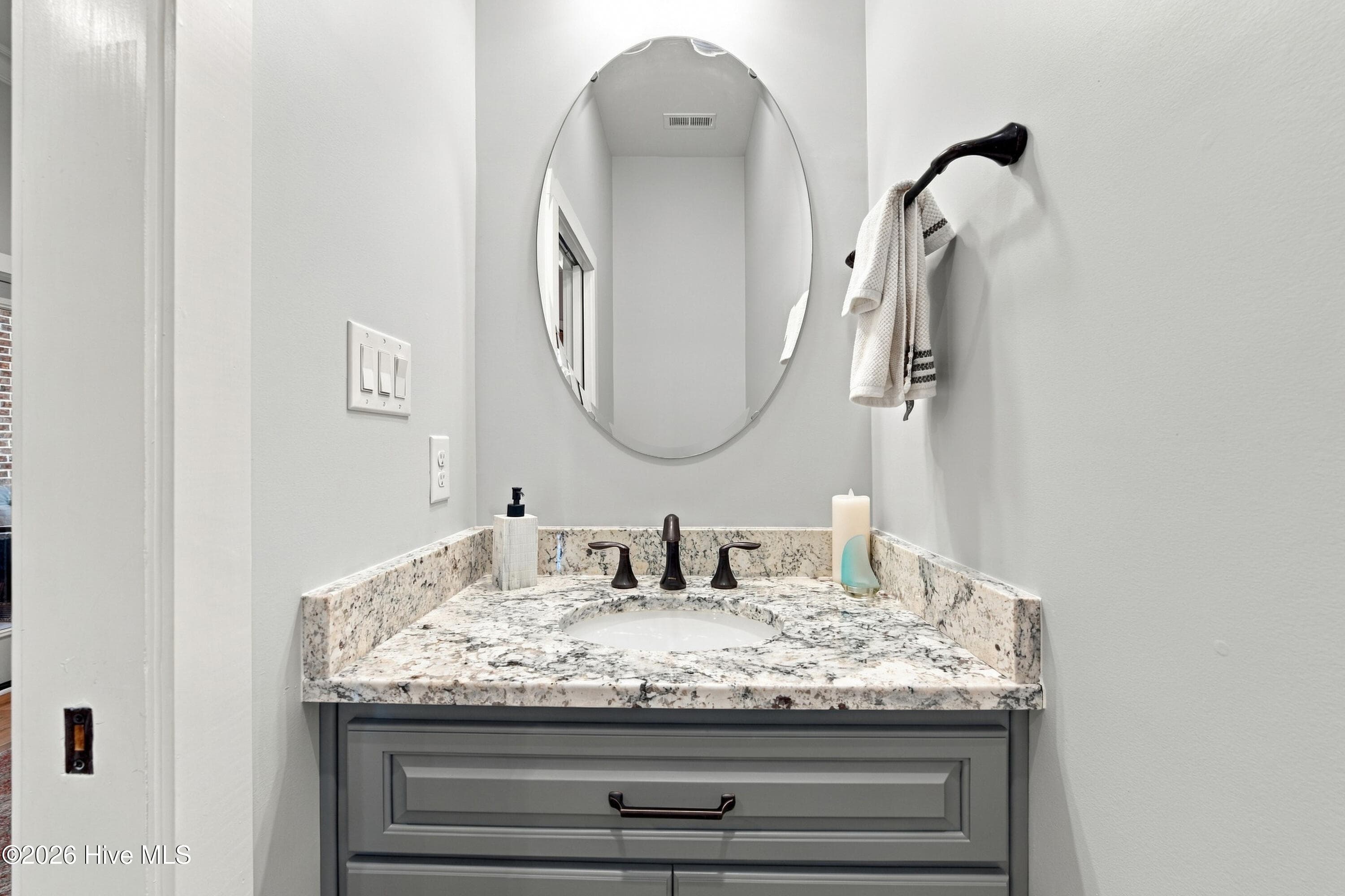 Half bath from foyer - 4557 Moss Bend, New Bern, NC 28562
