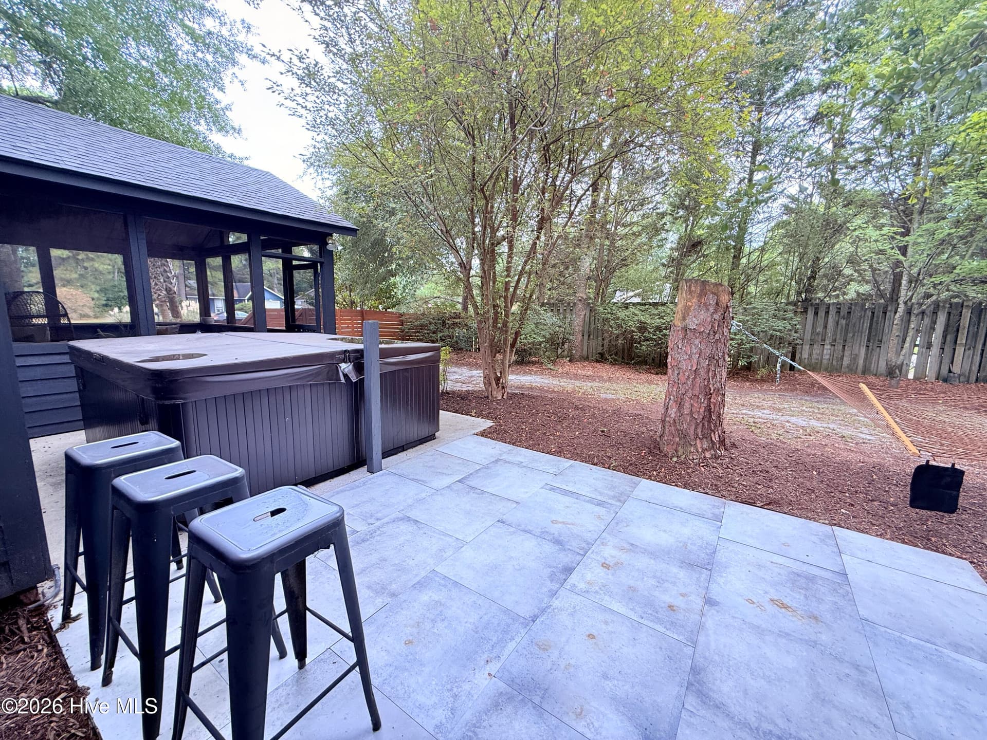 Side patio merges the screened in porch with the Main Suite door to the hot tub! - 1001 Hunting Ridge Road, Wilmington, NC 28412
