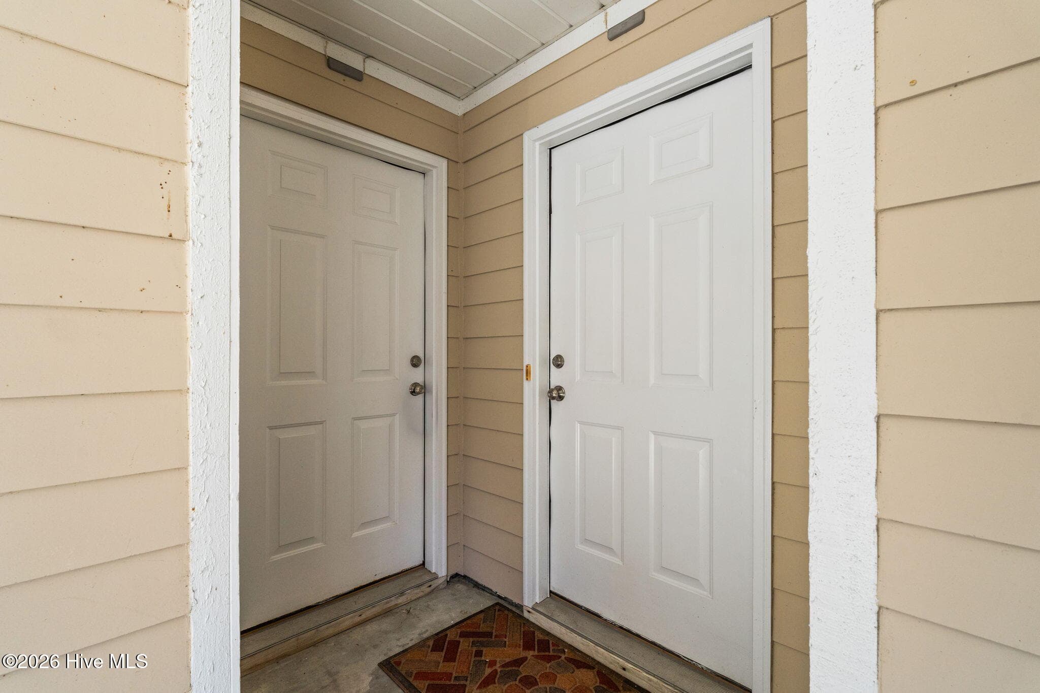 Door on left enters into lockout; door on right into main unit - 3350 Club Villas Drive # 801, Southport, NC 28461, Southport