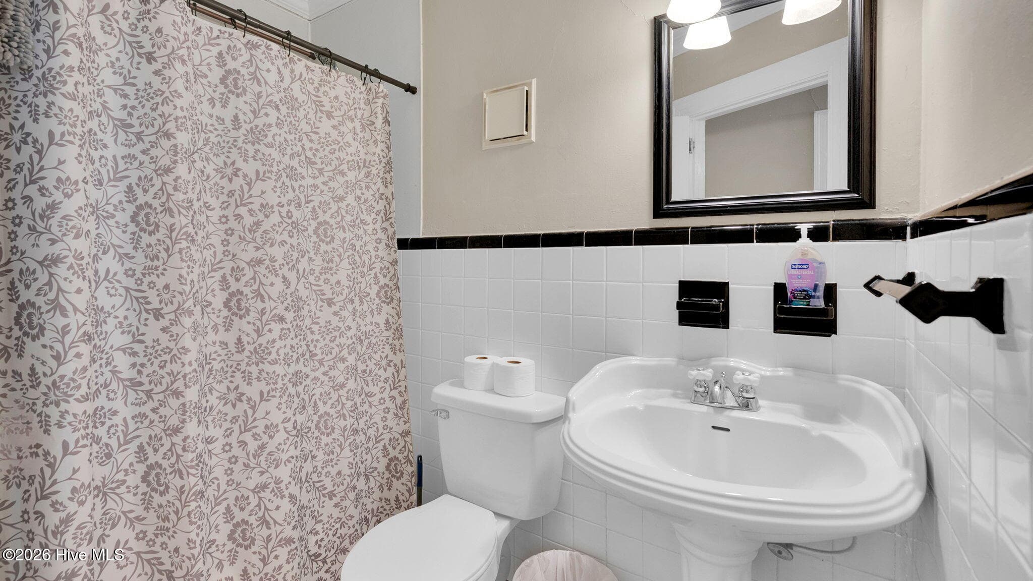 hall bath down stairs - 1902 Sherwood Drive, Greenville, NC 27858