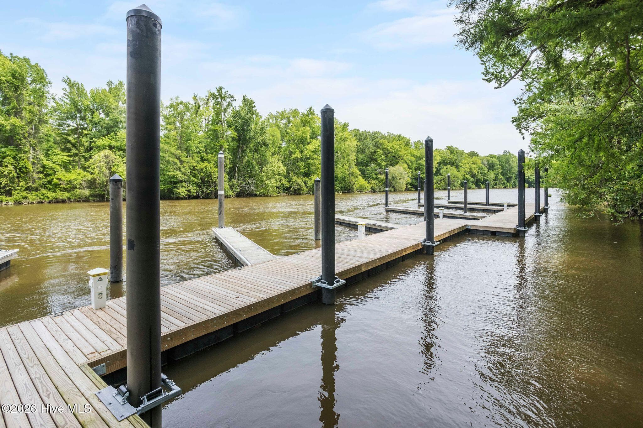 The commute to the Cape Fear River is measured in golf cart minutes. - 9281 221 Buccaneer Court NE, Leland, NC 28451