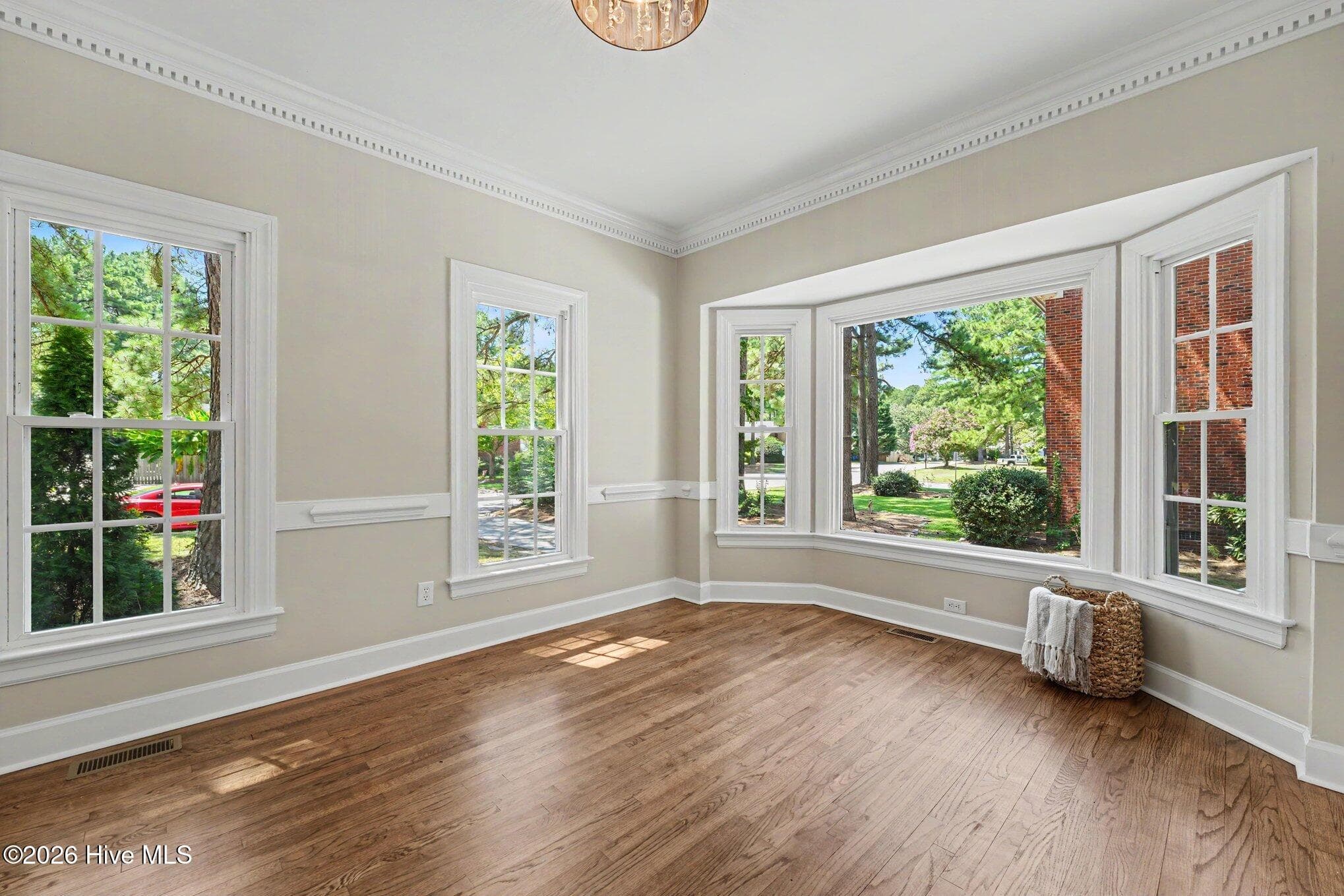 Formal dining with chair and crown moldings, and bay window - 2112 Burnside Drive NW, Wilson, NC 27896