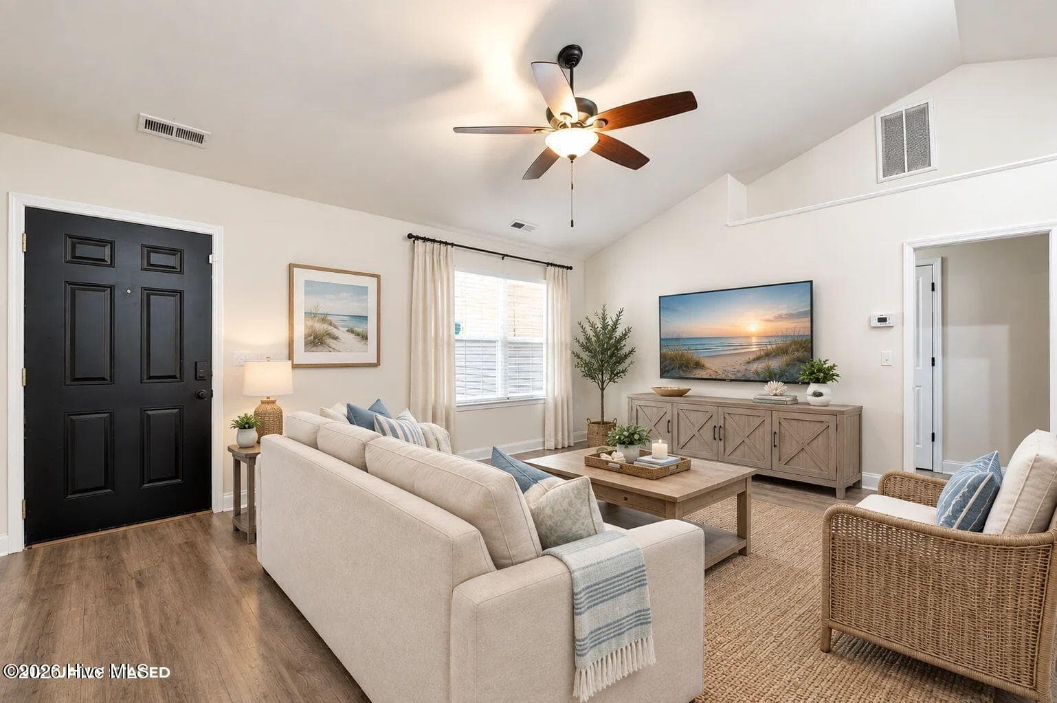 Virtually staged living room - 122 Pond View Circle, Hampstead, NC 28443
