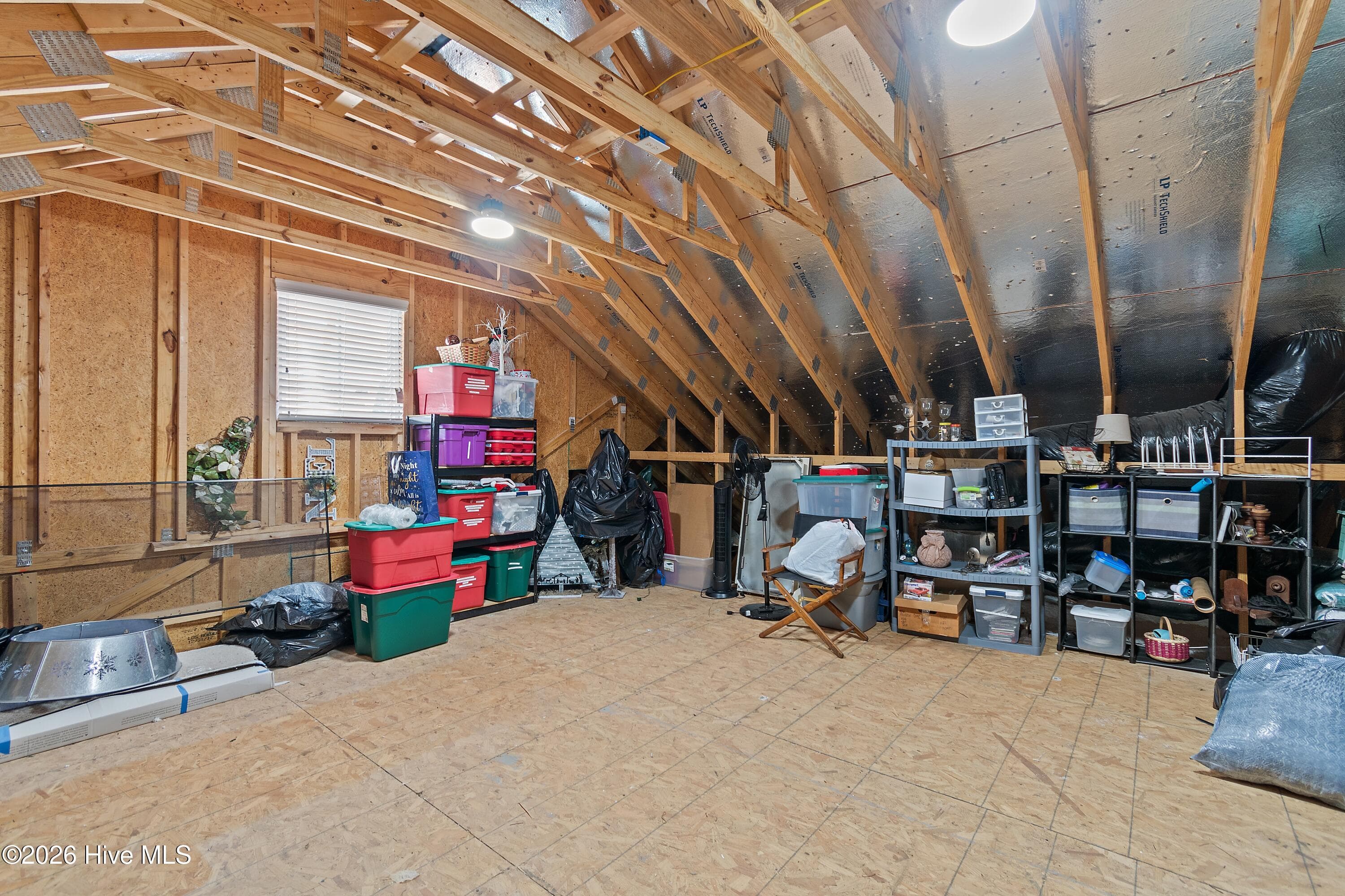 Second floor of home- this is a walk-in storage room. This room has tons of potential! - 6358 Bryson Drive SW, Ocean Isle Beach, NC 28469
