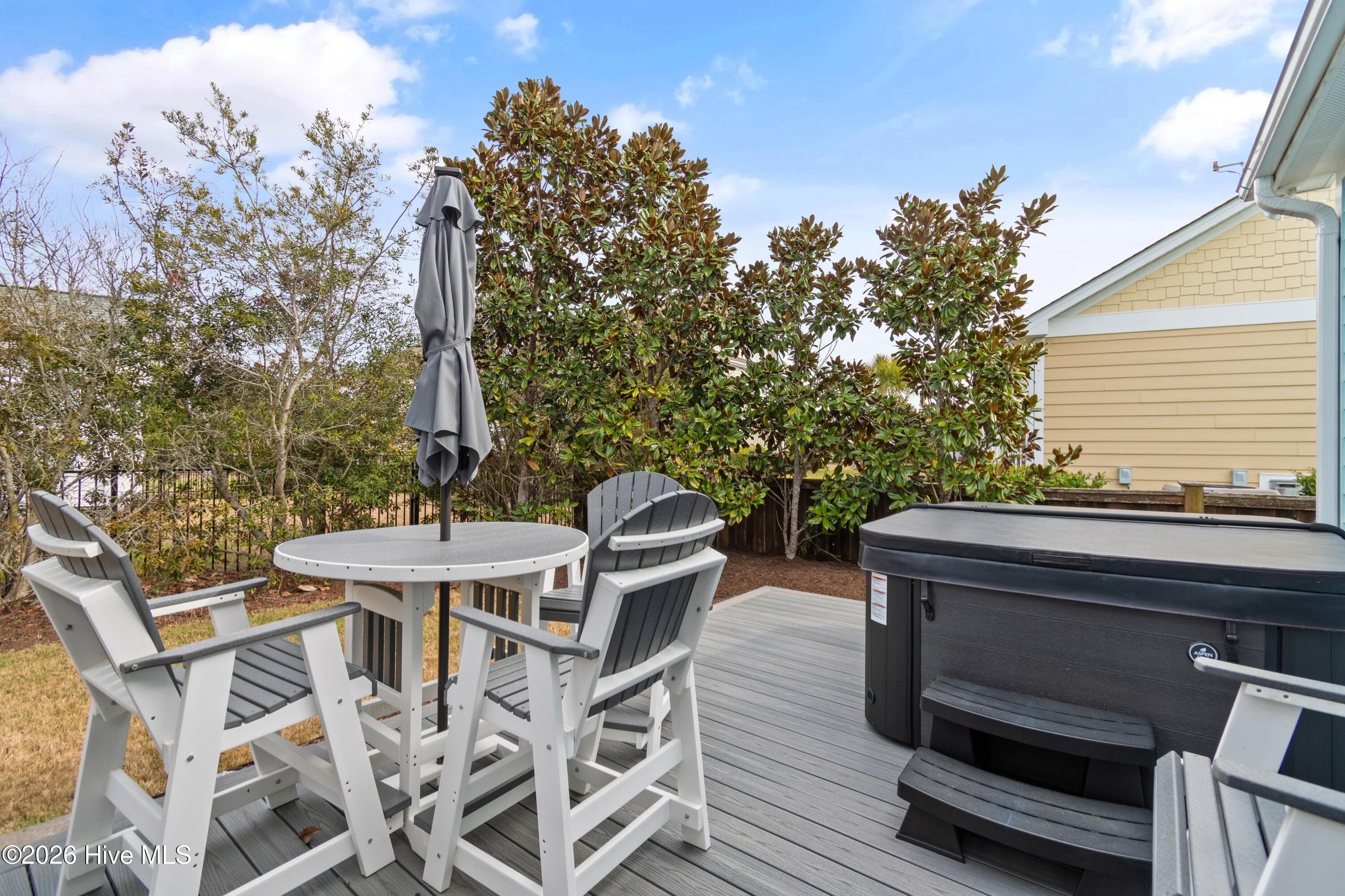 Deck with composite decking and hot tub (reinforced decking under hot tub). - 6358 Bryson Drive SW, Ocean Isle Beach, NC 28469
