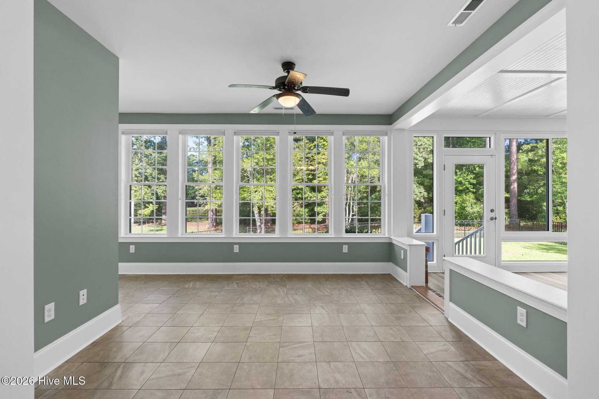 View from Breakfast Area to Sunrooom - 461 Springwood Drive SE, Bolivia, NC 28422