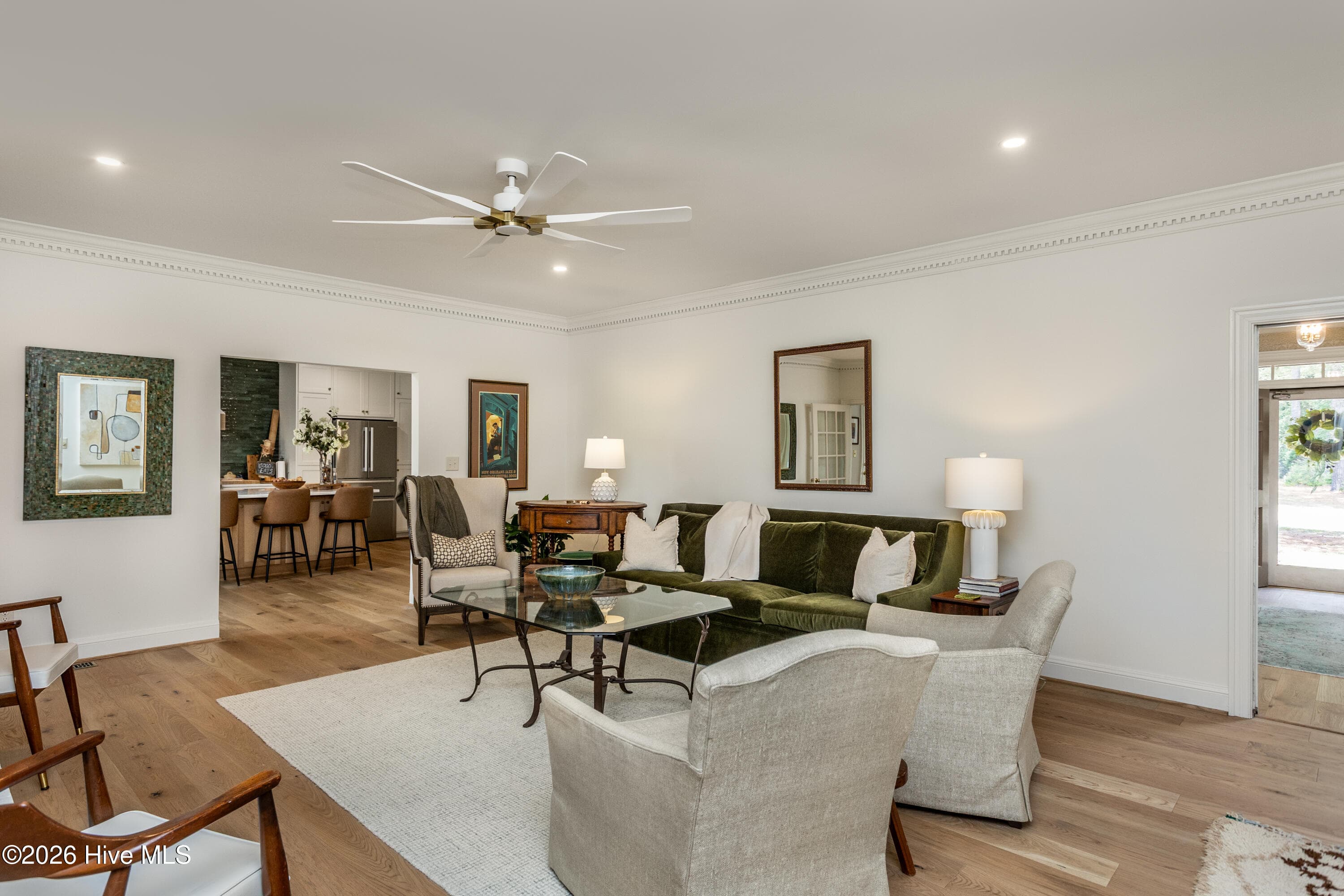 Very spacious family room perfect for entertaining with adjacent bar room, sunroom and kitchen. - 5050 Country Club Drive N, Wilson, NC 27896