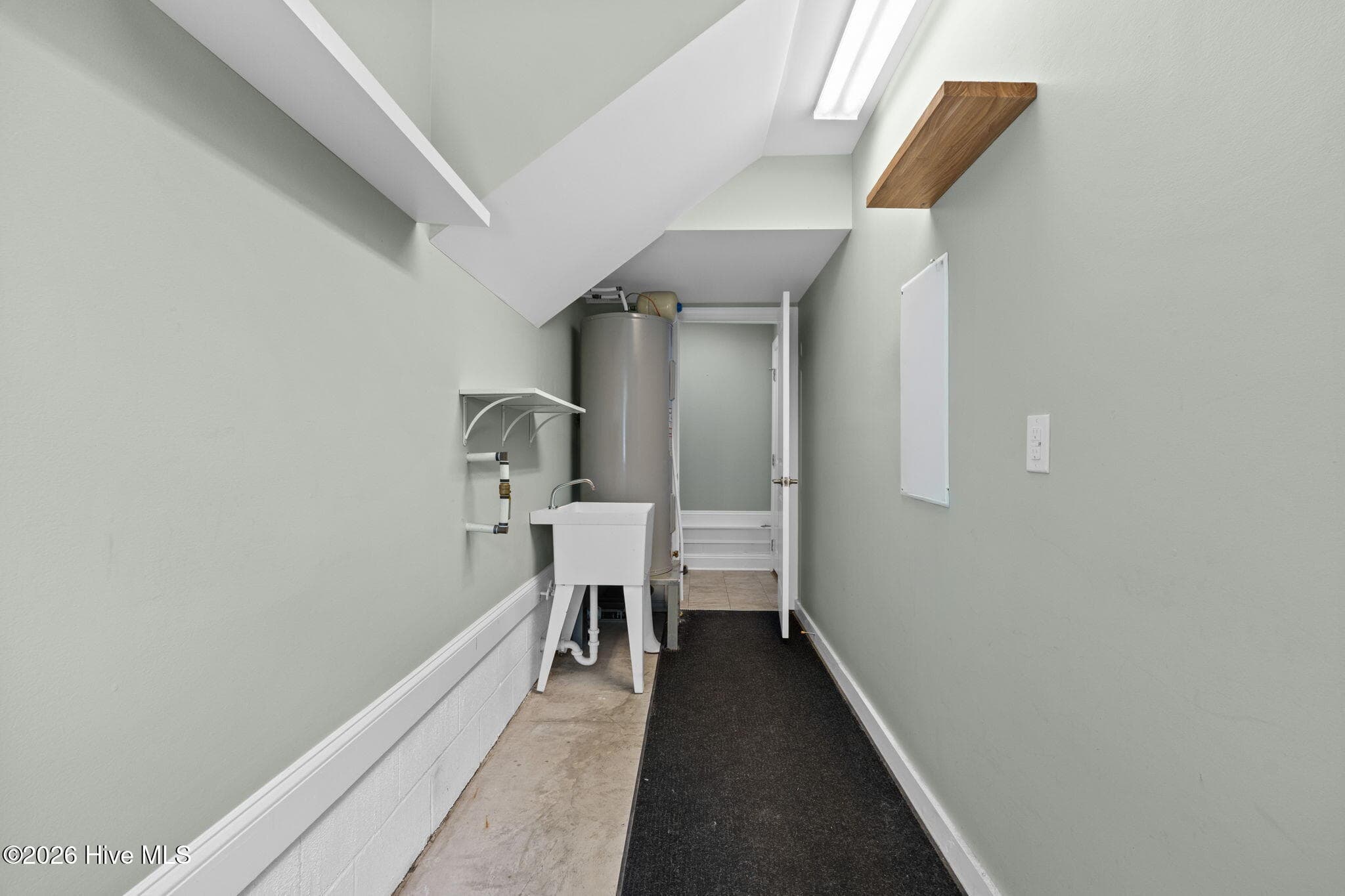 Utility Room/Storage Room with Sink - 461 Springwood Drive SE, Bolivia, NC 28422