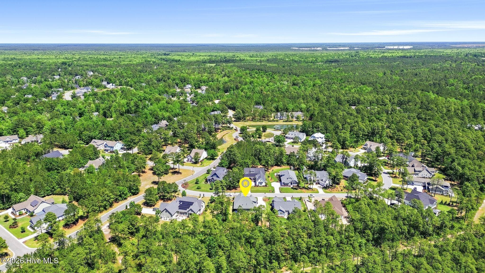 Aerial view of the home and surrounding area. - 3710 Friendly Orange Court NE, Leland, NC 28451