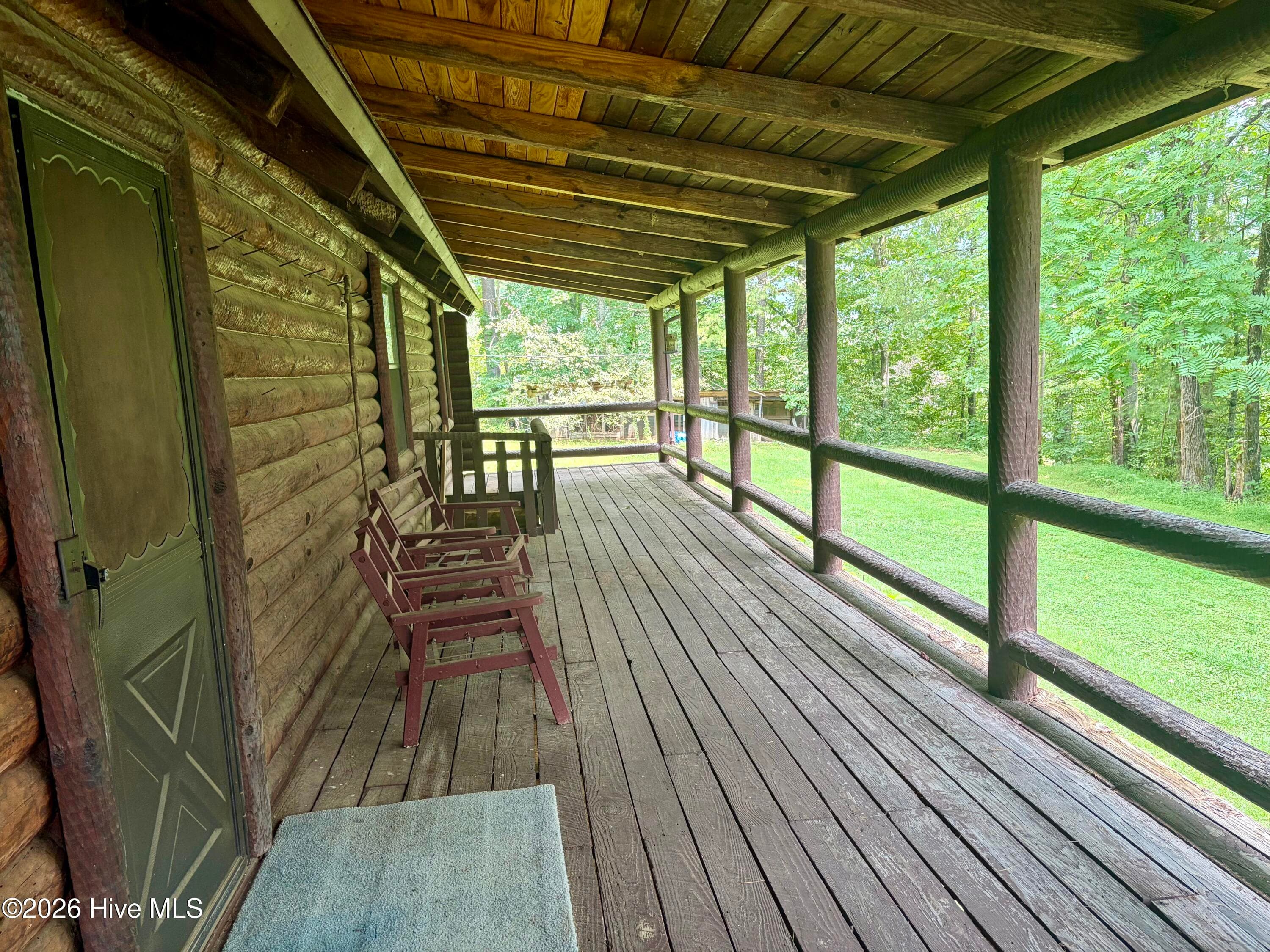 Come sit awhile on this beautiful porch - 913 Franks Creek Road, Robbinsville, NC 28771