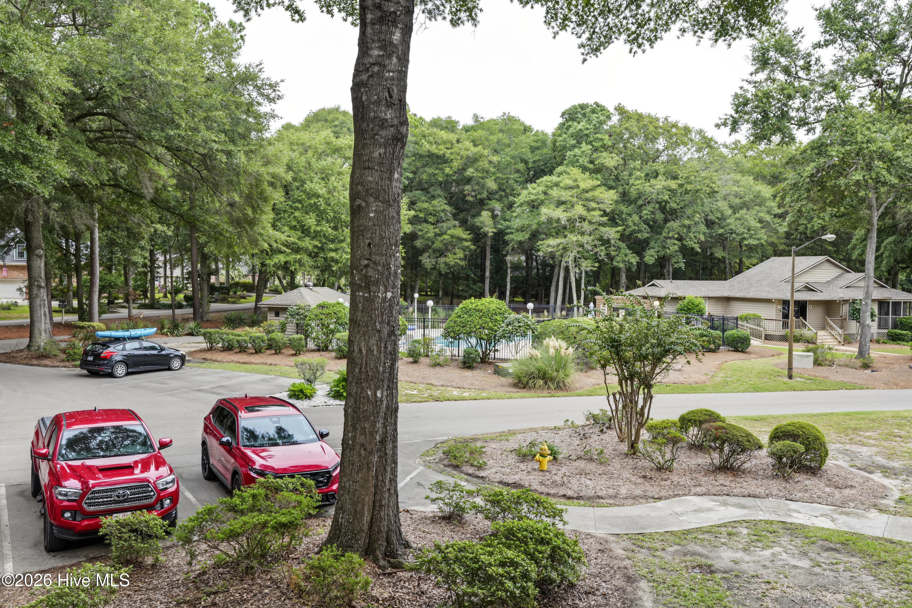 Pool located just across the parking lot. - 803 Colony Place SW Unit D, Sunset Beach, NC 28468