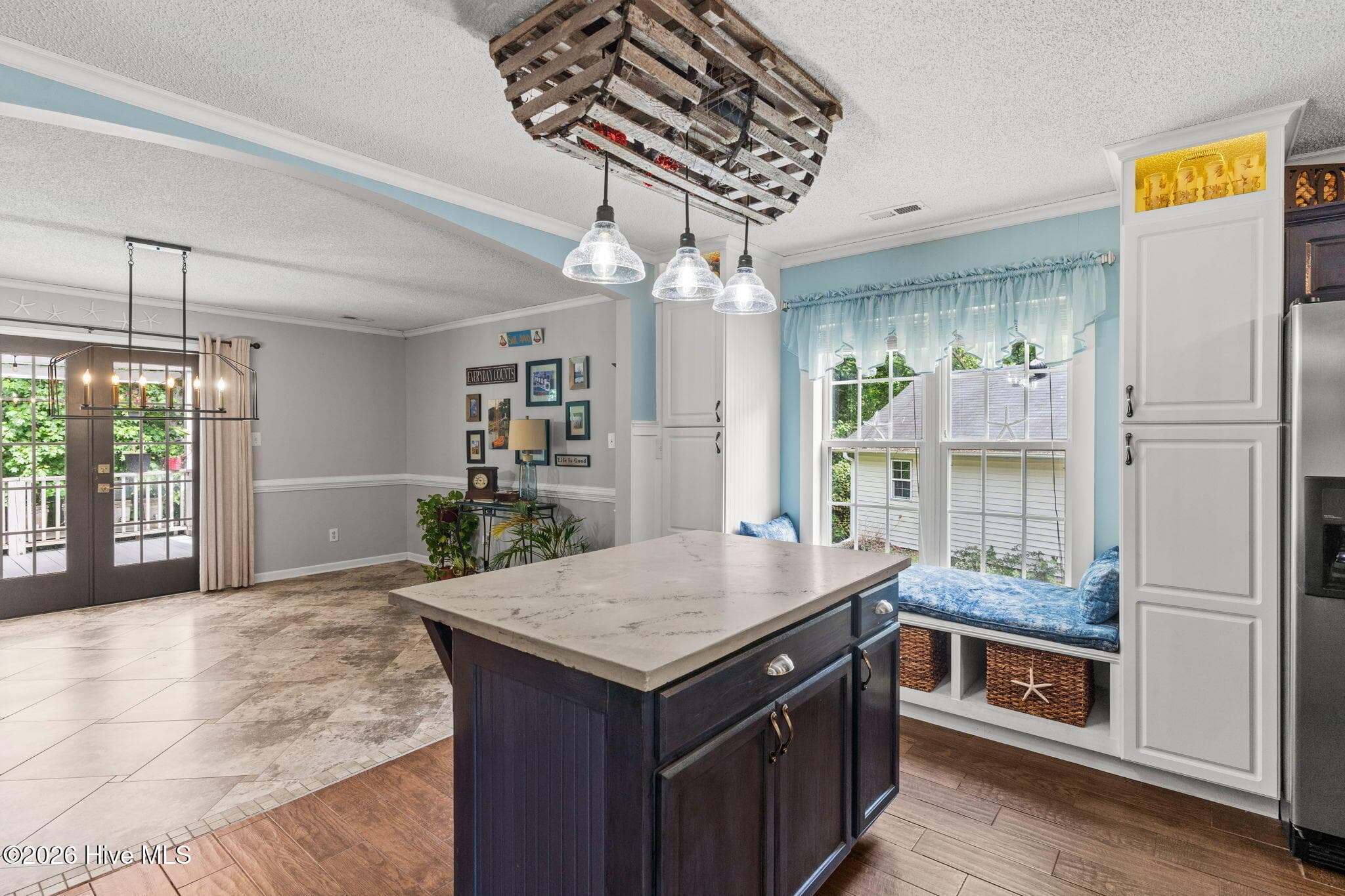 Dining room opens to living room - 9184 Seaside Landing SW, Calabash, NC 28467