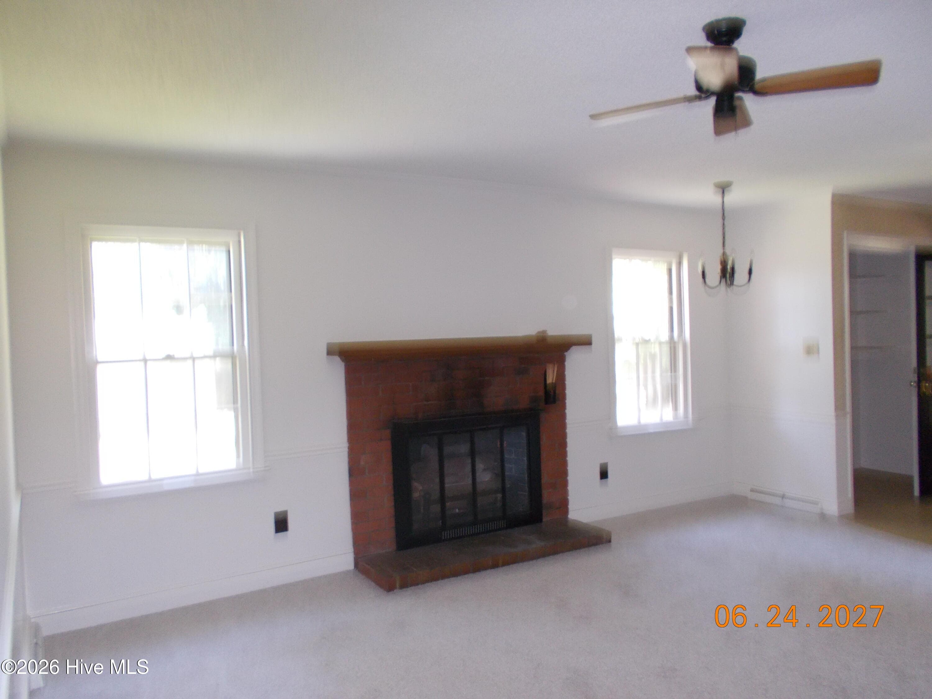 Fireplace with gas logs in the family room - 2209 Stanton Road, Kinston, NC 28504