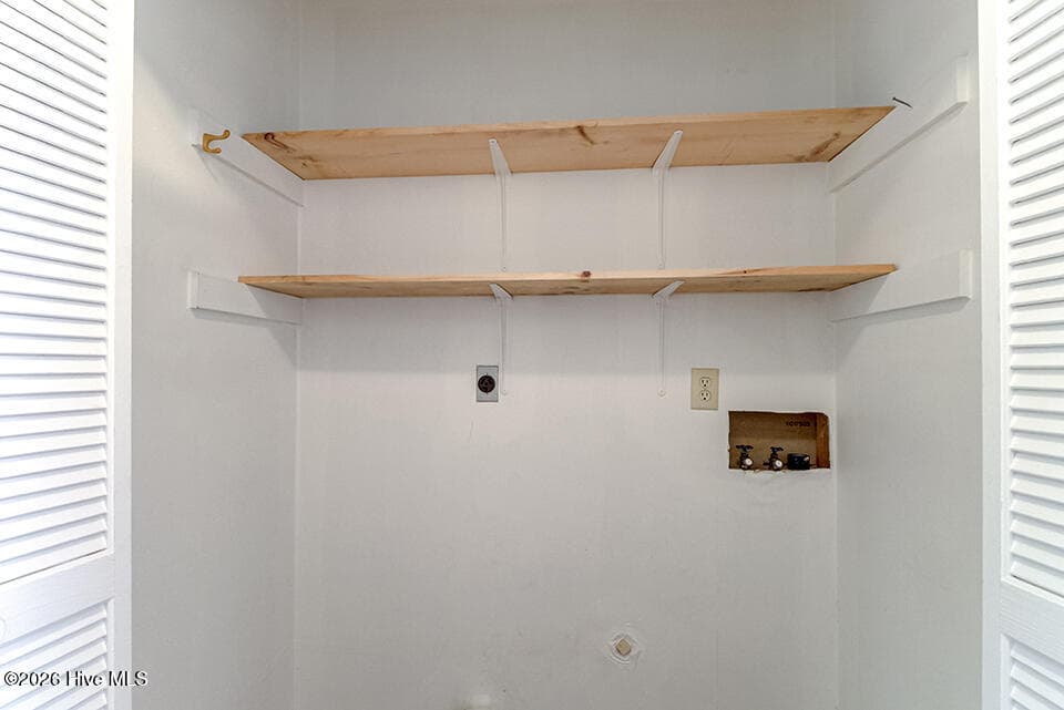 Laundry closet in kitchen - 4908 Marlin Court, Wilmington, NC 28403