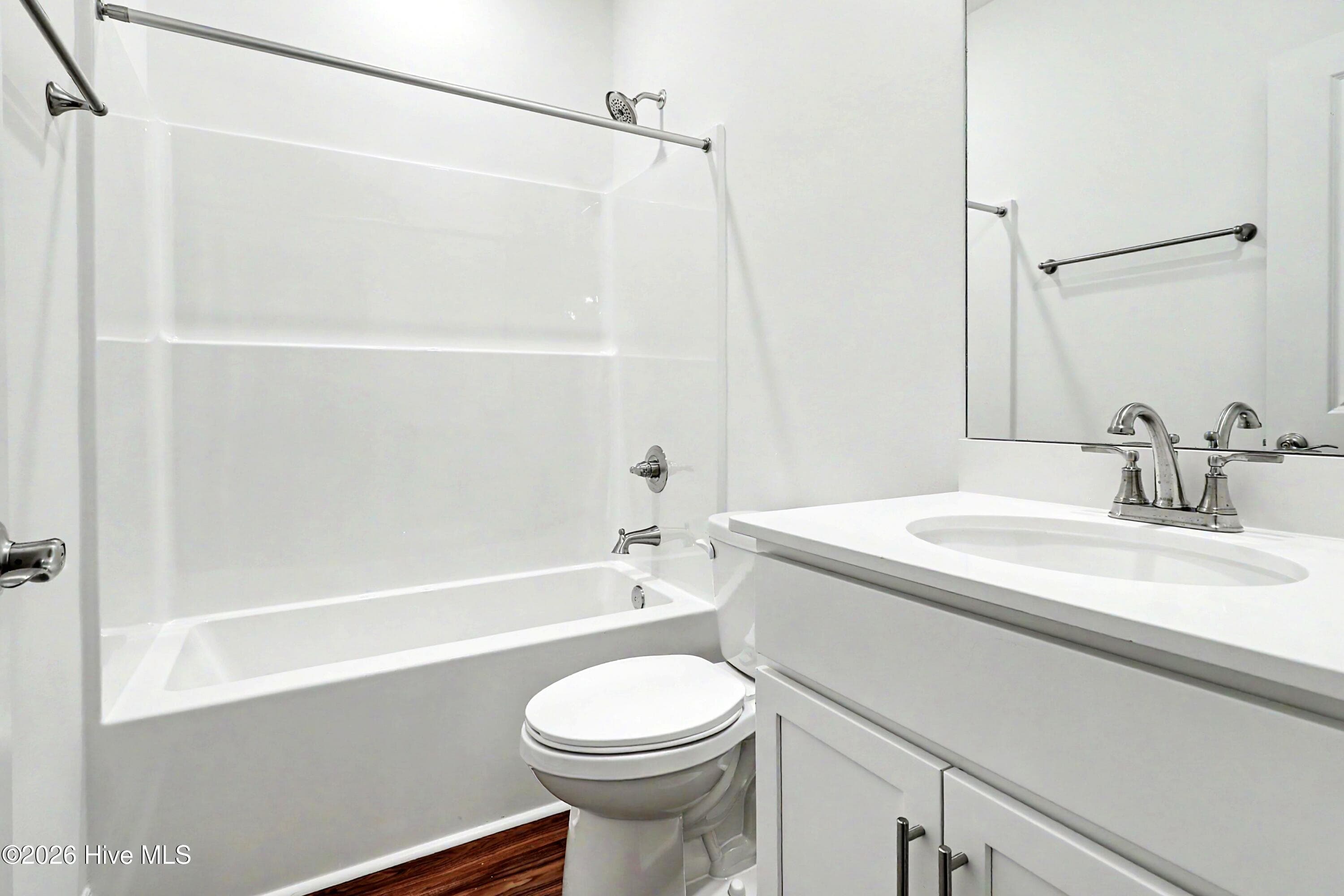 Guest Bath with deep tub and comfort height vanity. - 2111 Cregan Cove SW (Lot 19), Ocean Isle Beach, NC 28469
