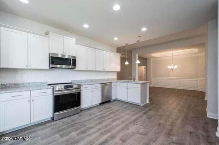 Only $1000 down and financial incentives offered with use of a preferred lender. Photos are of the same floor plan in a different community and are for layout purposes only. Upgrades, colors and finishes may differ. *This home is still under construction* - 174 Seashore Street, Grimesland, NC 27837