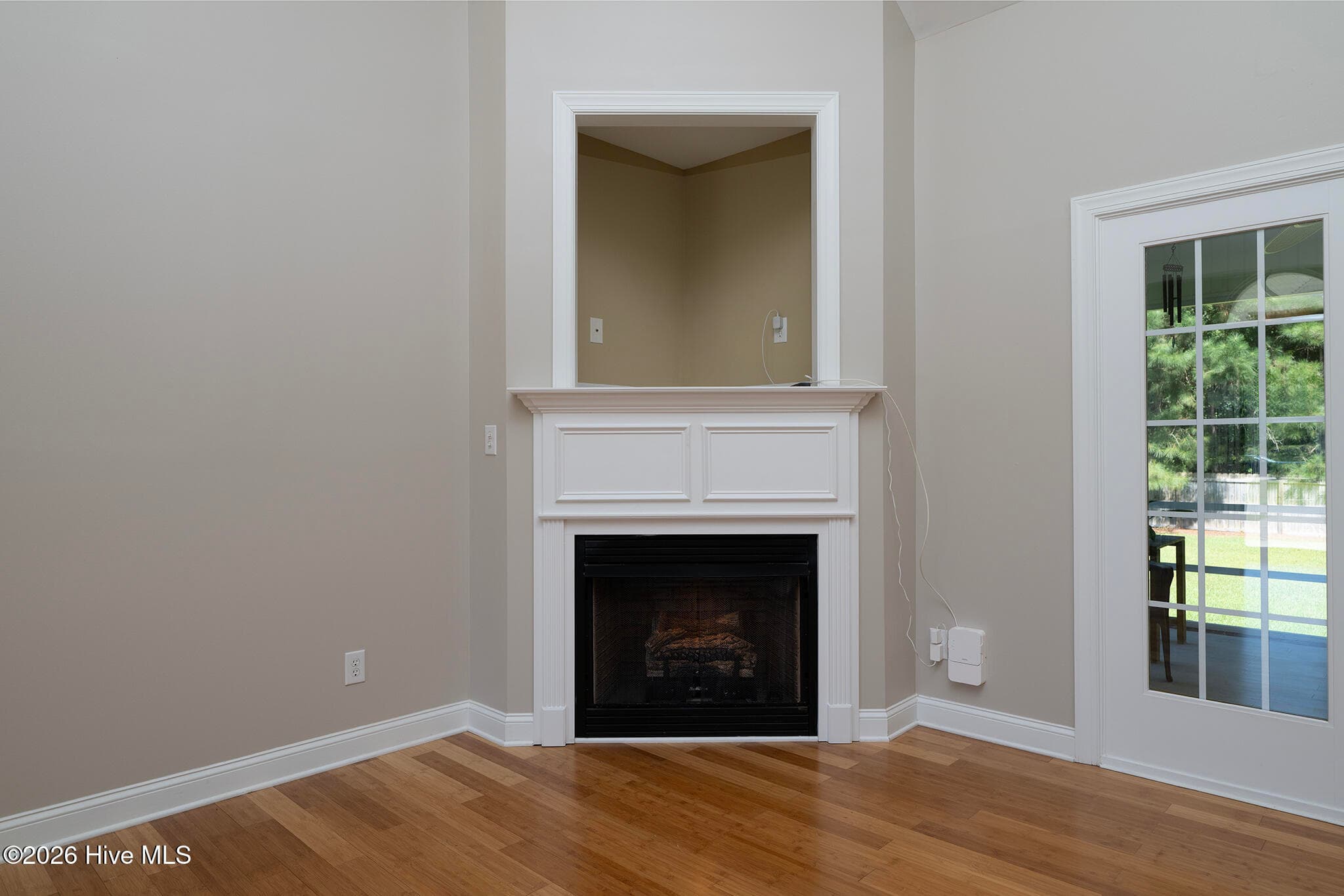 Living Room with Cozy Corner Fireplace - 168 Laura Drive, New Bern, NC 28562