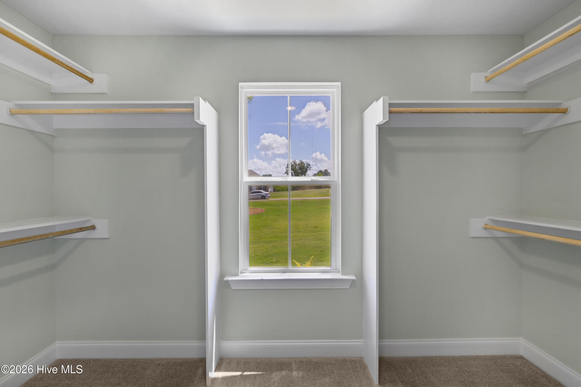 Primary closet has wood shelving - 1340 Bellingham Drive, Beech Island, SC 29842