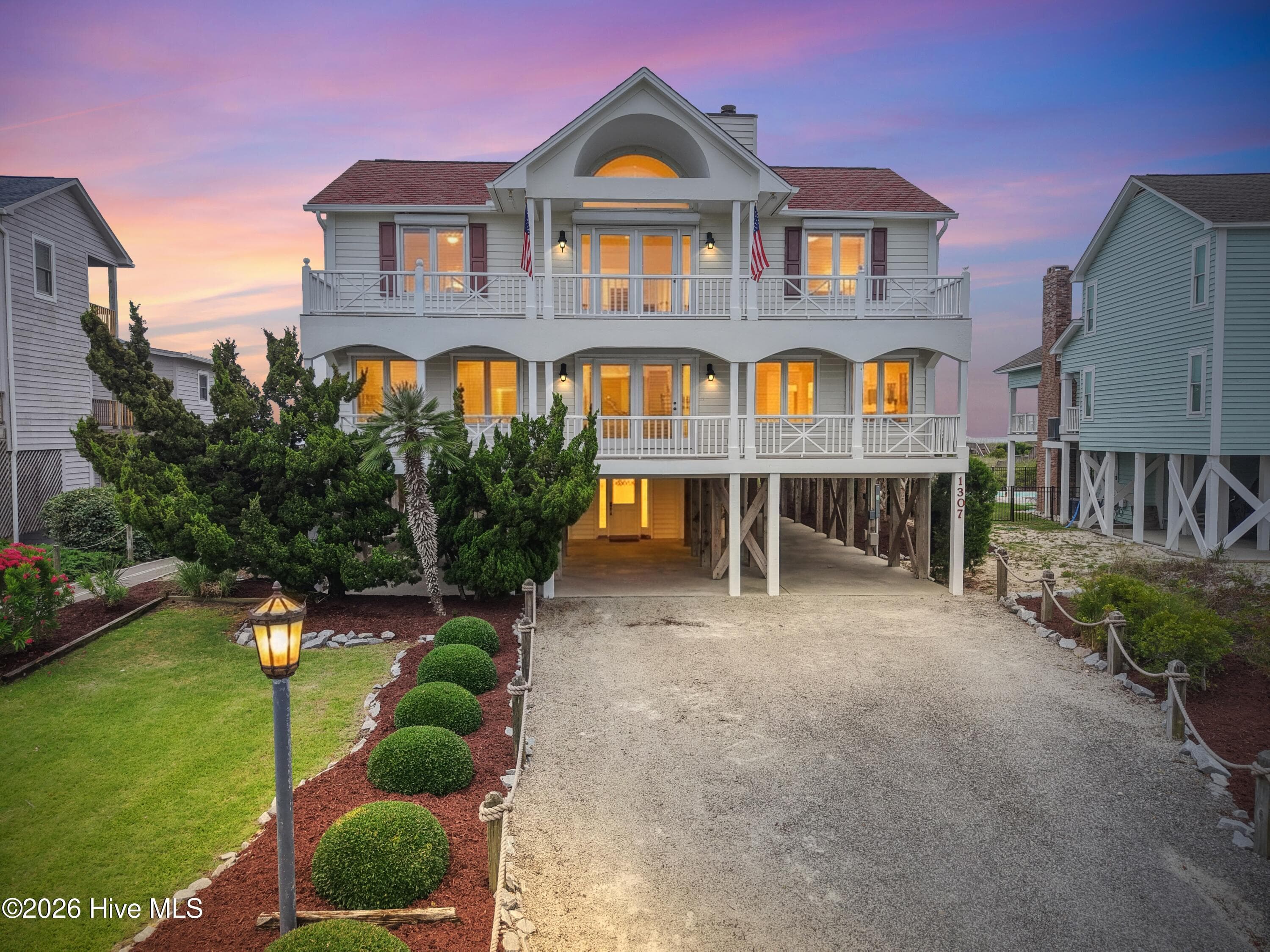 Single Family Residence at 1307 Ocean Boulevard W, Holden Beach, NC 28462, photo 2 of 109