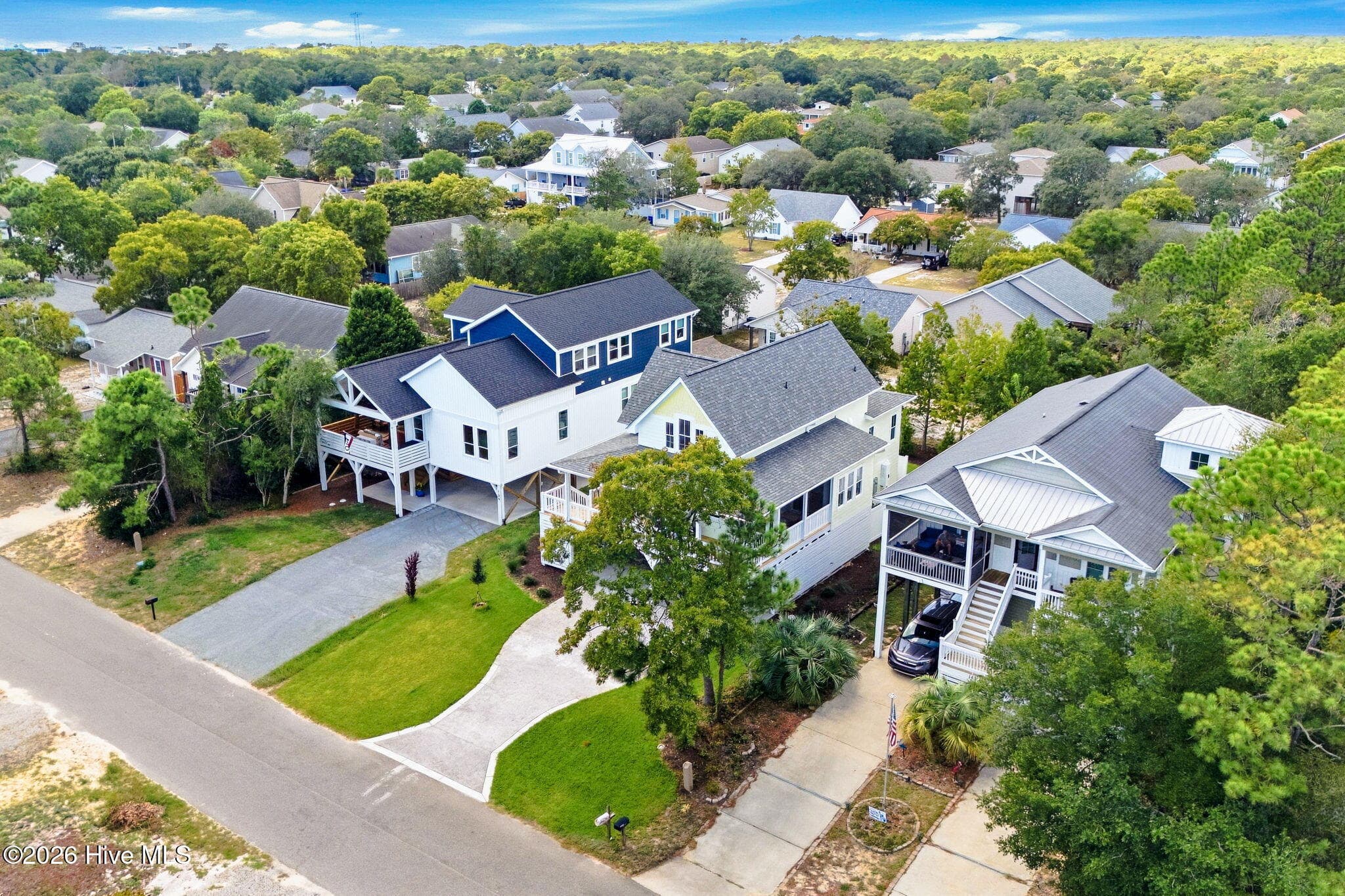 Front Sly View - 141 NE 10th Street, Oak Island, NC 28465