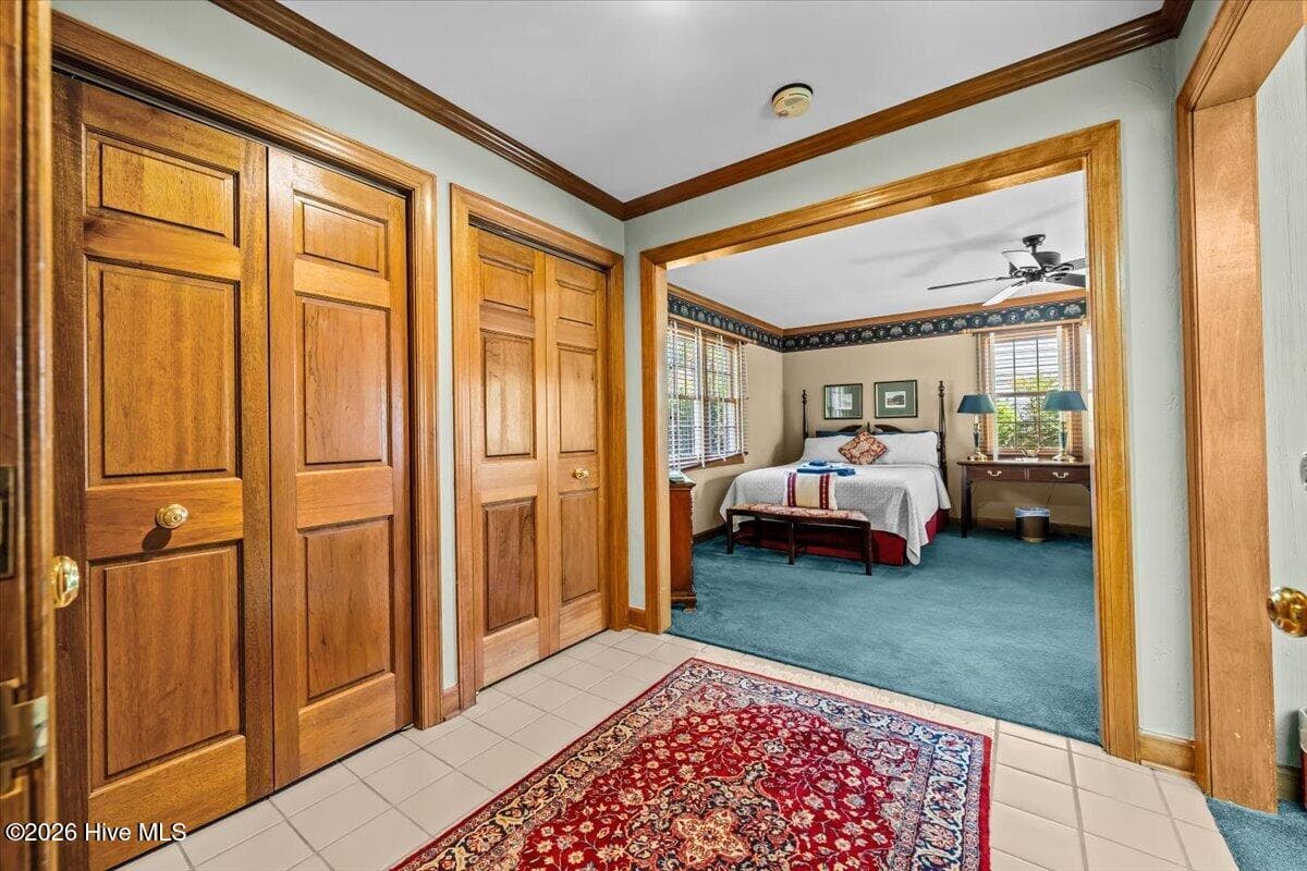 Front doors and entrance to first bedroom. - 50 Cochrane Castle Circle, Southern Pines, NC 28387
