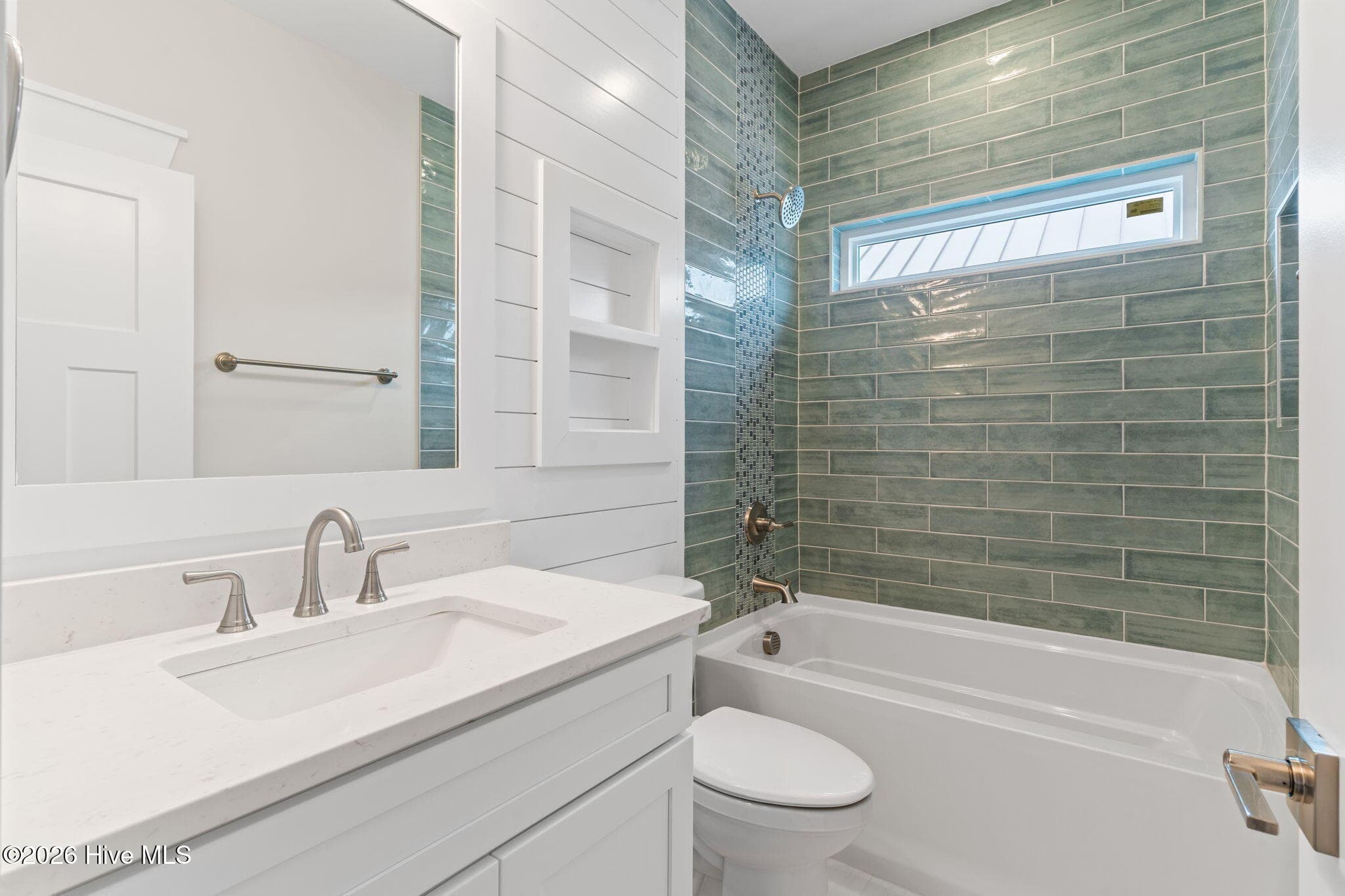 Photo is for illustrative purposes only of a similar home of same plan - 310 NE 58th Street, Oak Island, NC 28465