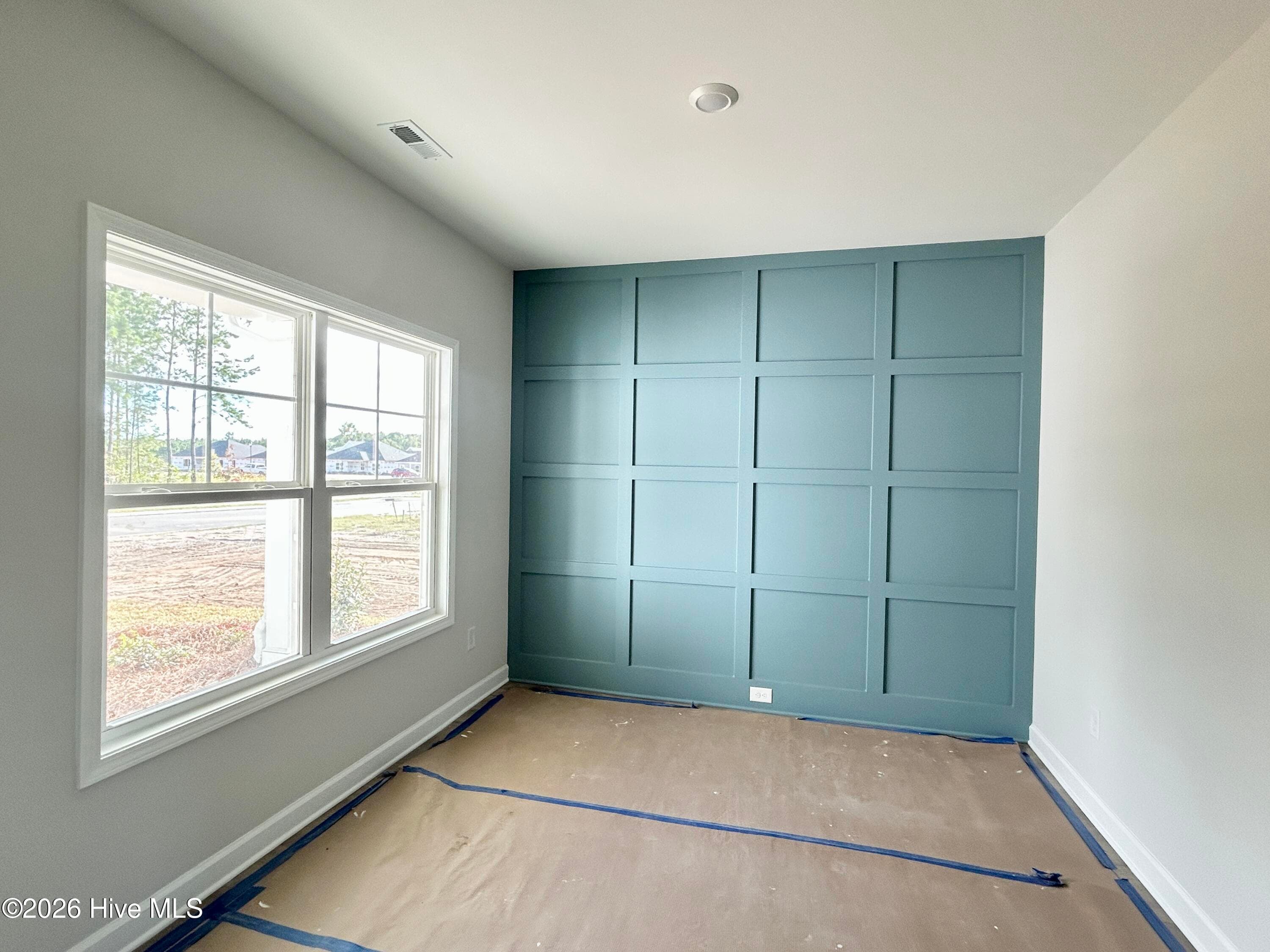 Flexible space with elegant accent wall - 9117 Carly Lane 61, Leland, NC 28451