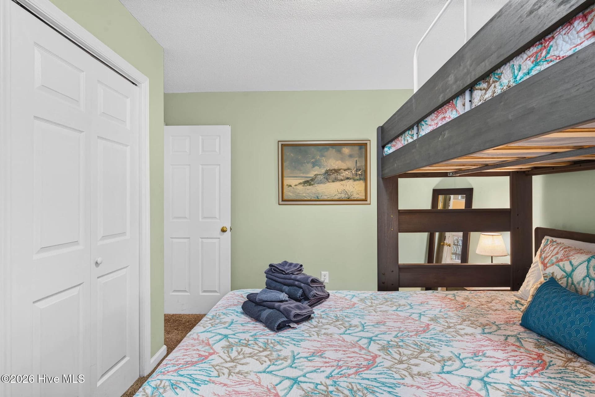 Bunk room setup creates flexible sleeping space for guests, making it especially functional for a coastal getaway. - 1650 Frink Street SW, Ocean Isle Beach, NC 28469