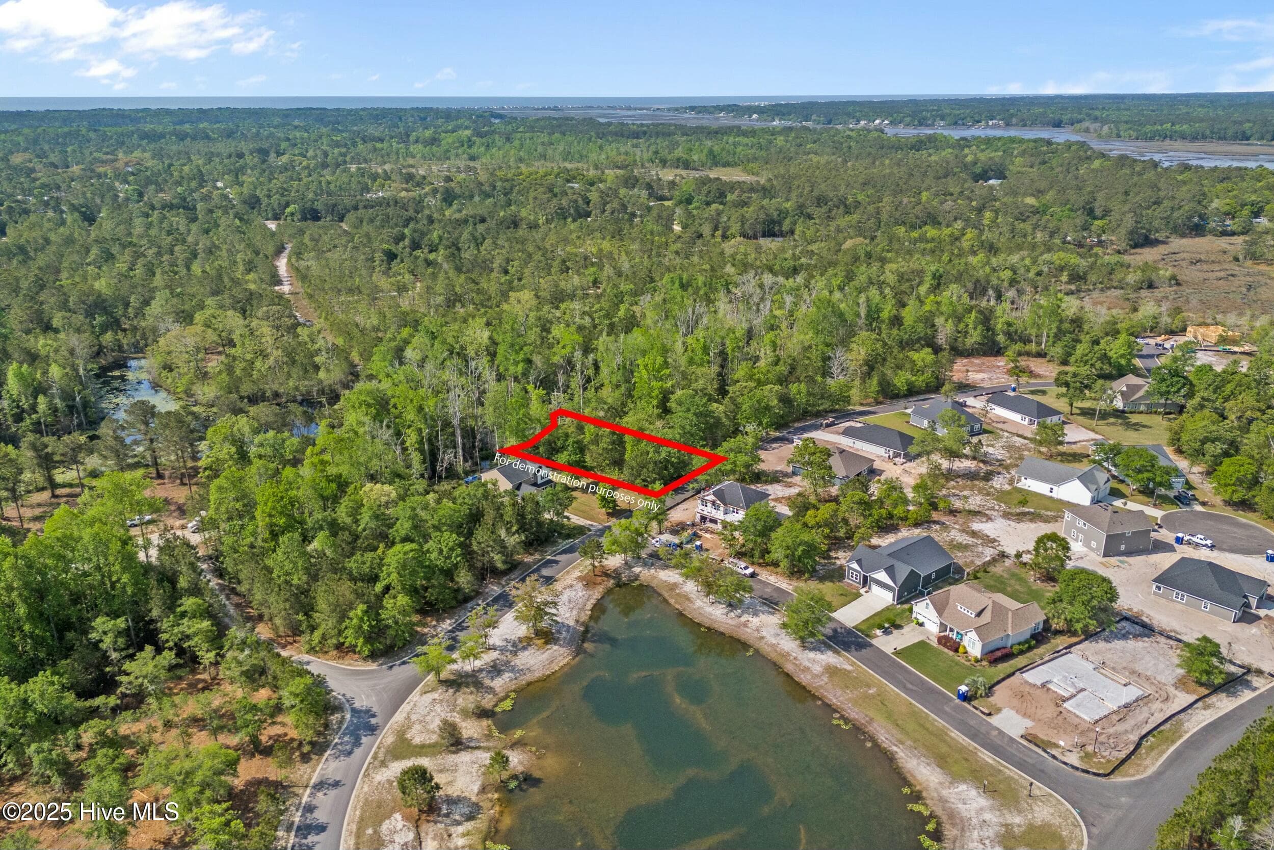Tucked away just minutes from the vibrant town of Shallotte, this lot offers a peaceful retreat without sacrificing convenience. - 3088 130 Brackenbury Street SW, Shallotte, NC 28470, Shallotte