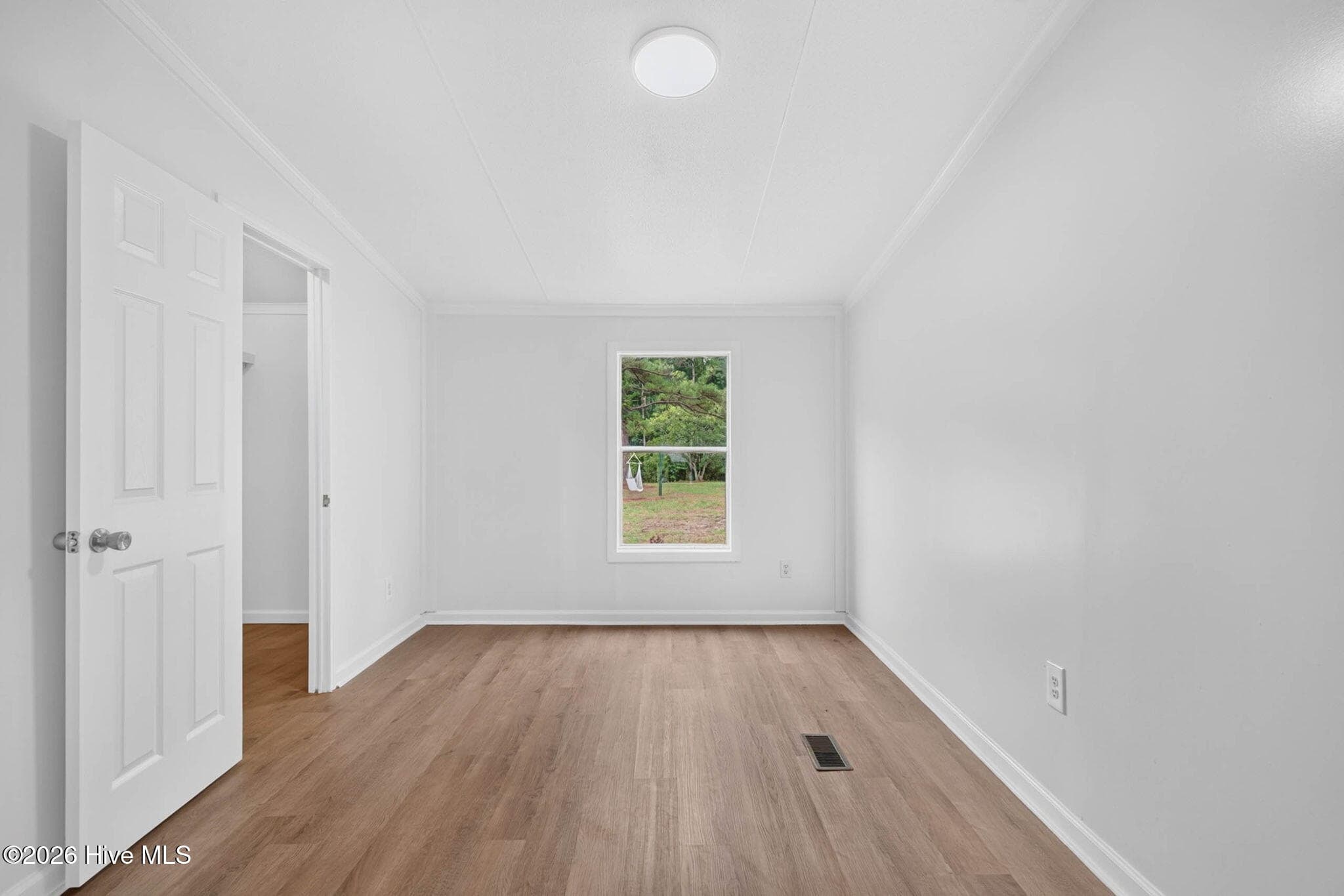 An additional flex space within the primary suite is perfect for a sitting room, reading nook, home office, or workout area. - 1199 Zack Street SE, Bolivia, NC 28422