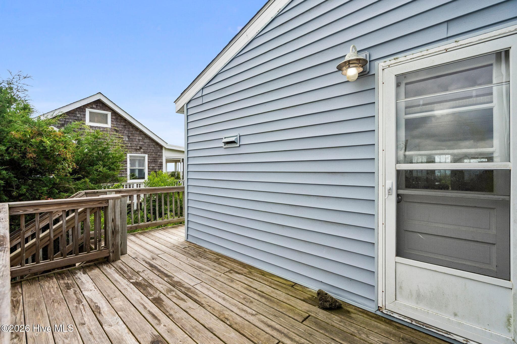 And the deck keeps going… wrapping around toward the front. - 129 S Anderson Boulevard A, Topsail Beach, NC 28445
