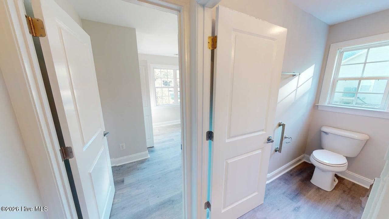 The split floor plan has the 2 Bedrooms and full bathroom on the SW side of the home. - 1114 Barkentine Drive, New Bern, NC 28560