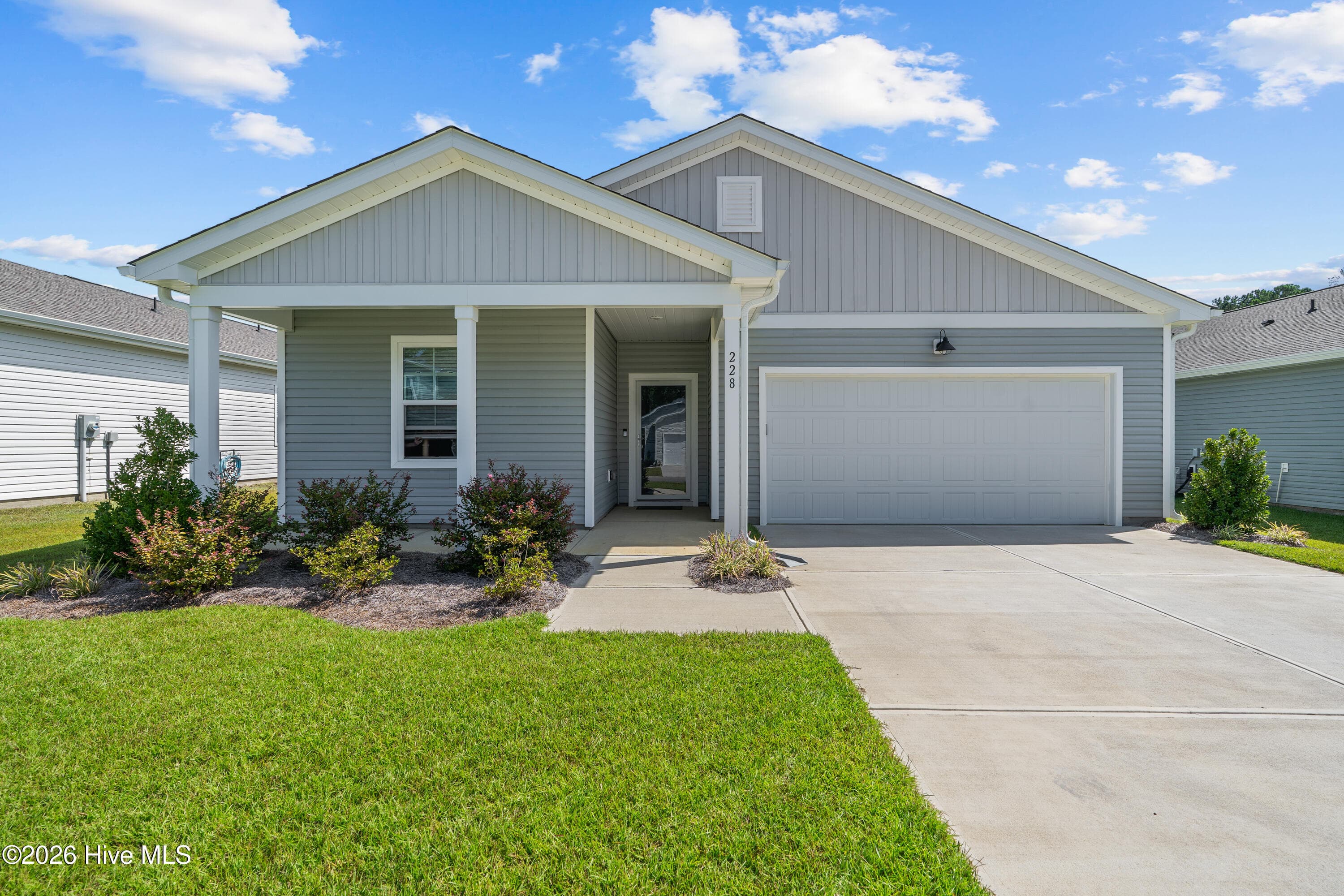 Single Family Residence at 228 Ocean Pointe Boulevard SE, Bolivia, NC 28422, photo 2 of 26