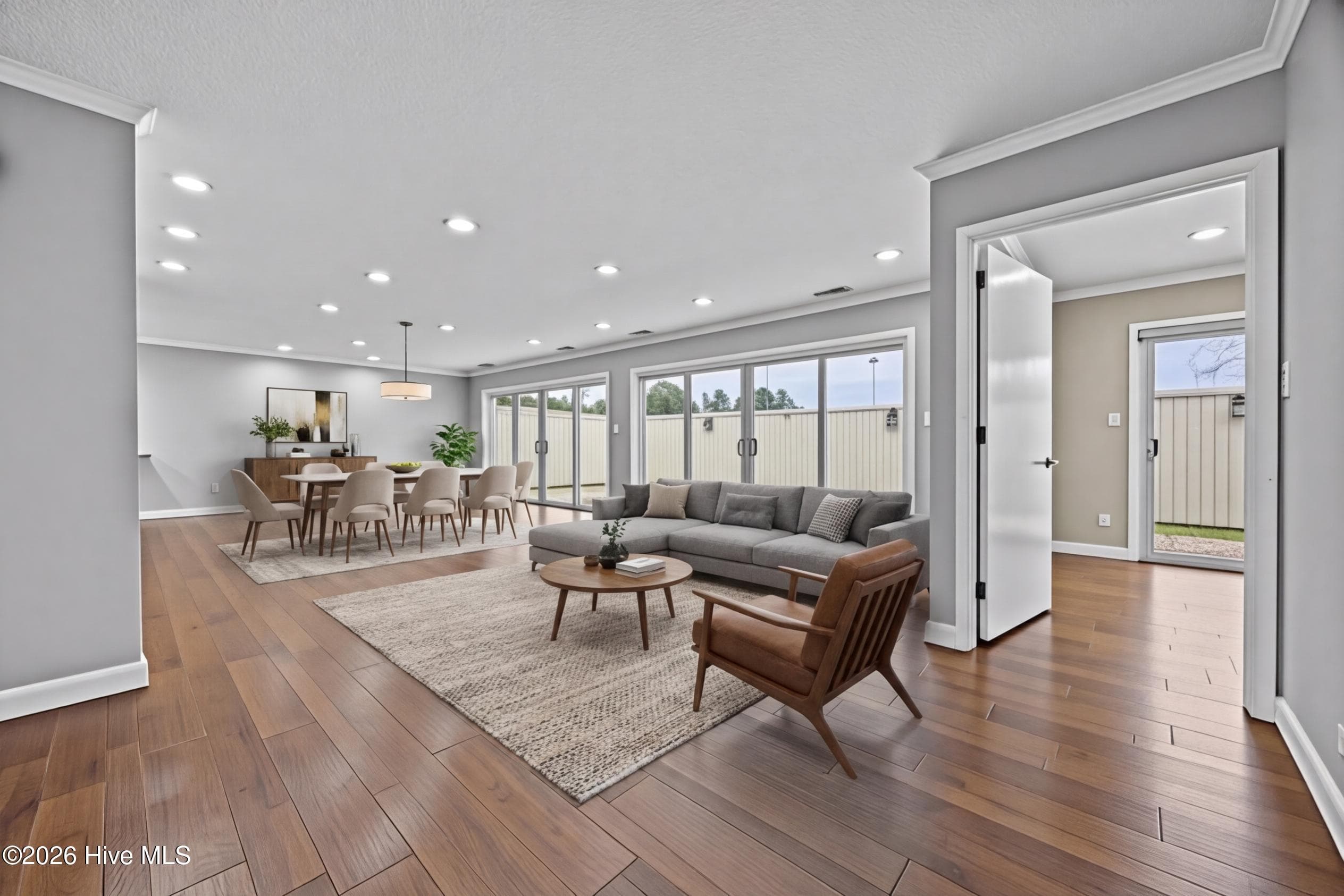 virtual staged living area - 616 E Murphy Street, Wallace, NC 28466