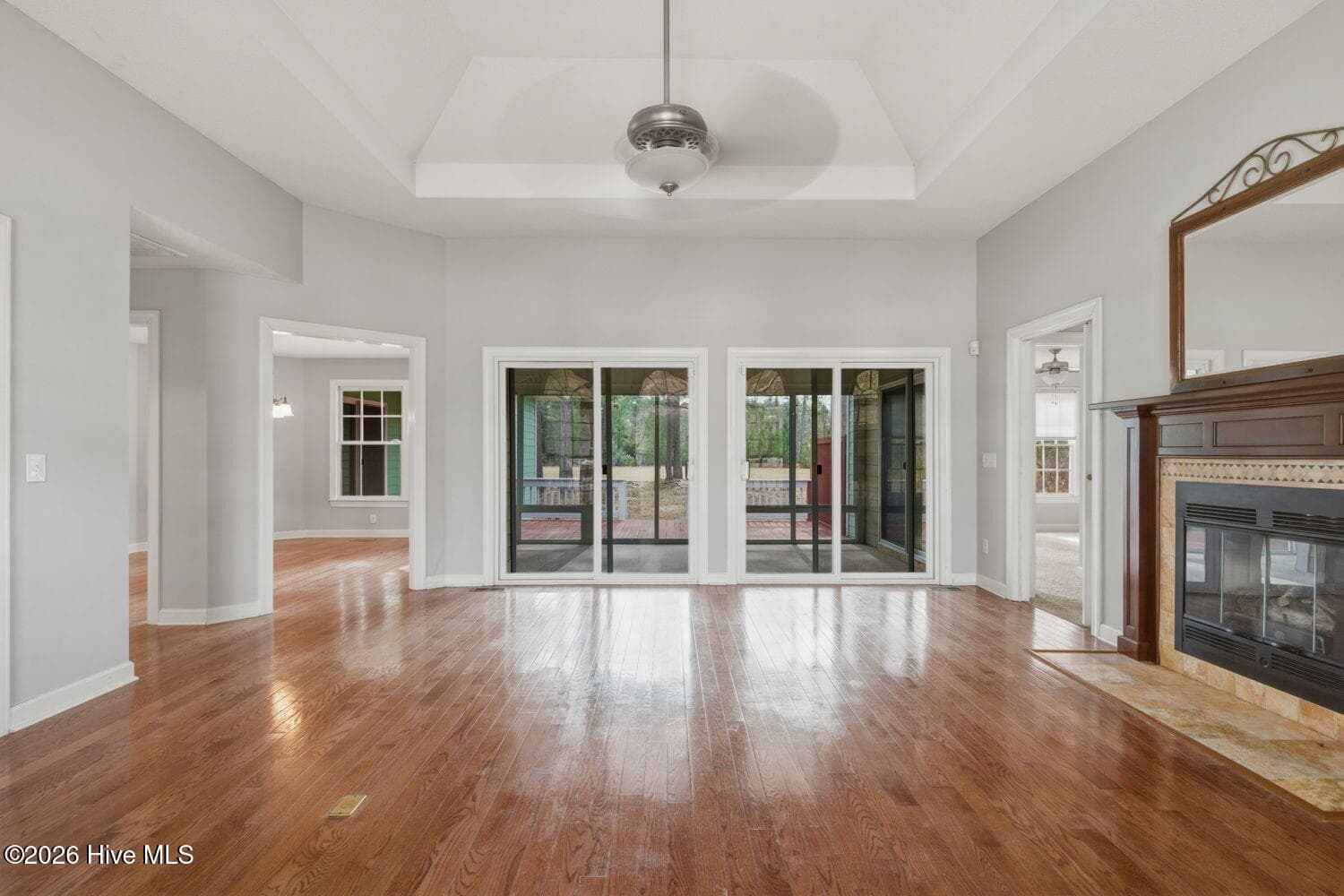 with sliders leading to sunroom - 53 Country Club Drive, Shallotte, NC 28470