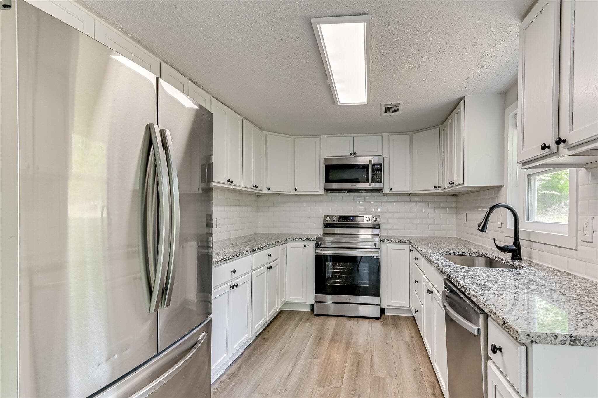 Updated and modern kitchen with Stainless Steel appliances. - 3616 Morgan Road, Hephzibah, GA 30815