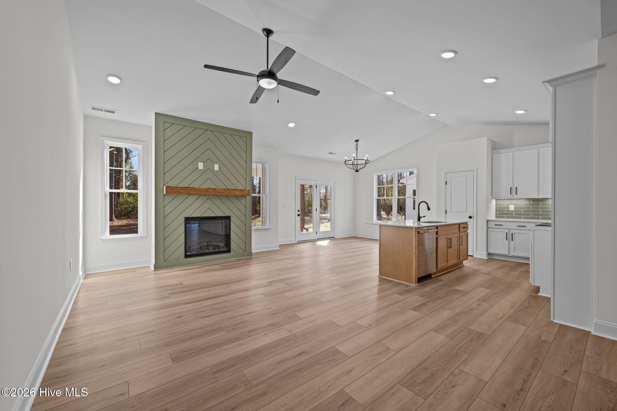Electric fireplace is the focal point - 1216 Petite Terre Court, New Bern, NC 28560