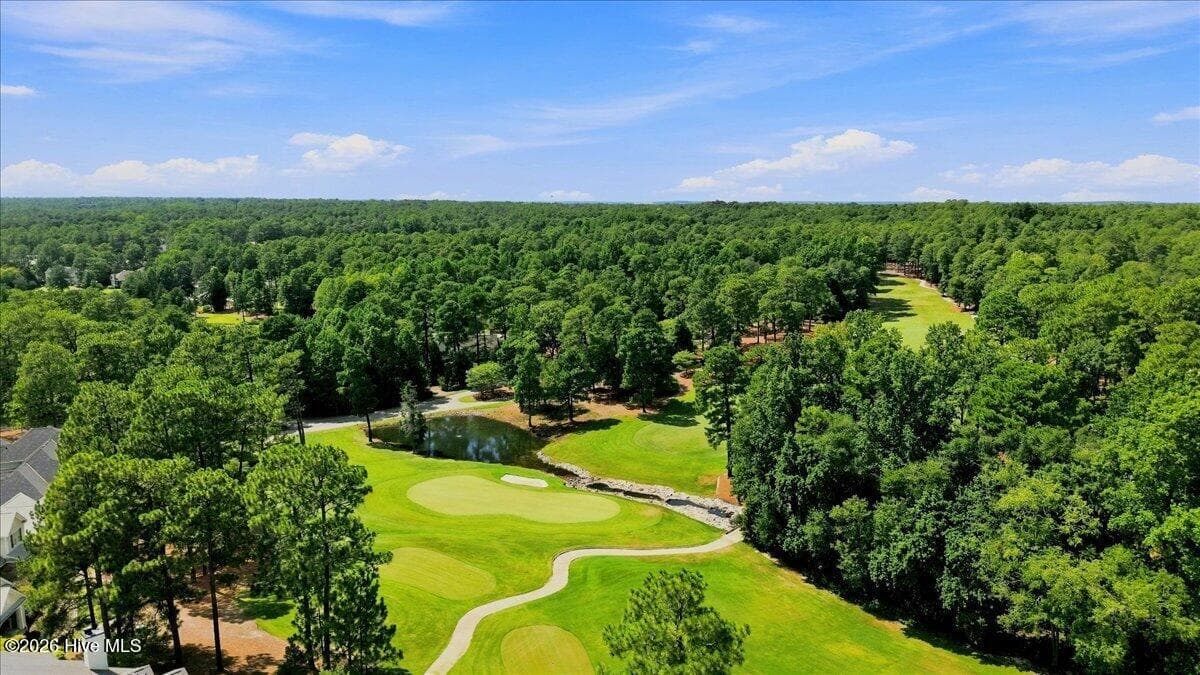 Enjoy outdoor living that flows to the golf course. - 240 Cochrane Castle Circle Apt E, Pinehurst, NC 28374
