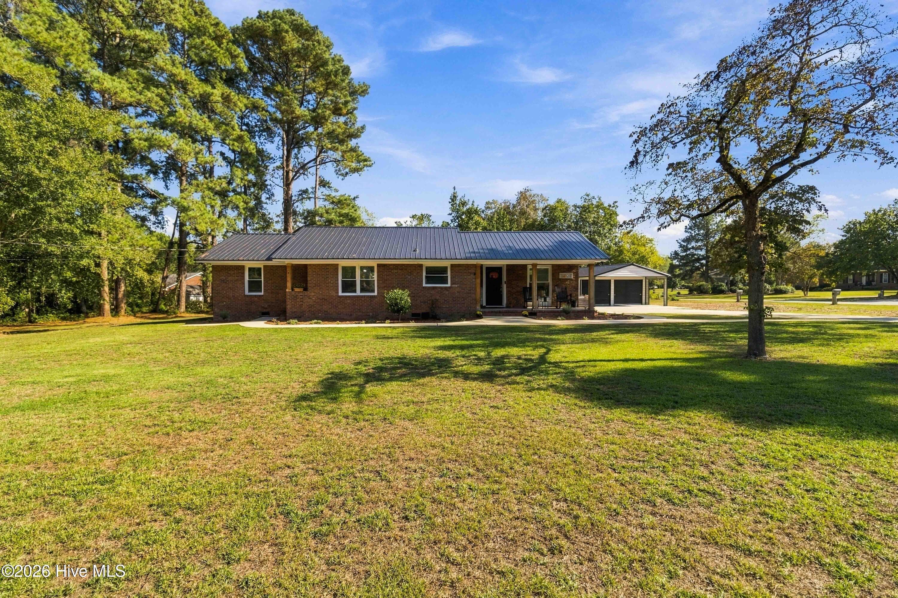 Single Family Residence at 4602 Lake Wilson Road, Elm City, NC 27822, photo 3 of 46
