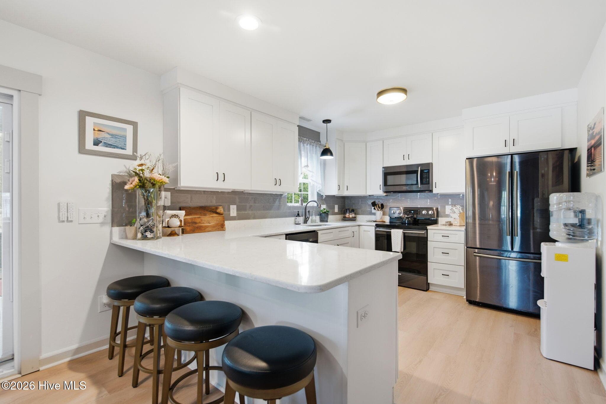 Kitchen with Bar/island - 101 NW 11th Street, Oak Island, NC 28465