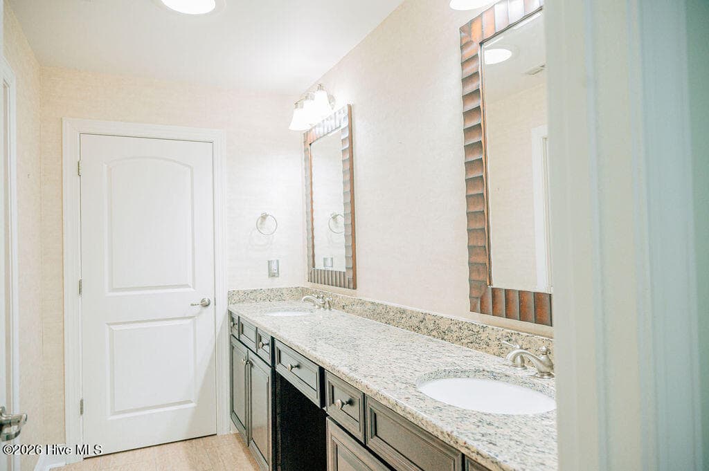 Primary bath with walk-in closet - 123 W Chelsea Court, Southern Pines, NC 28387