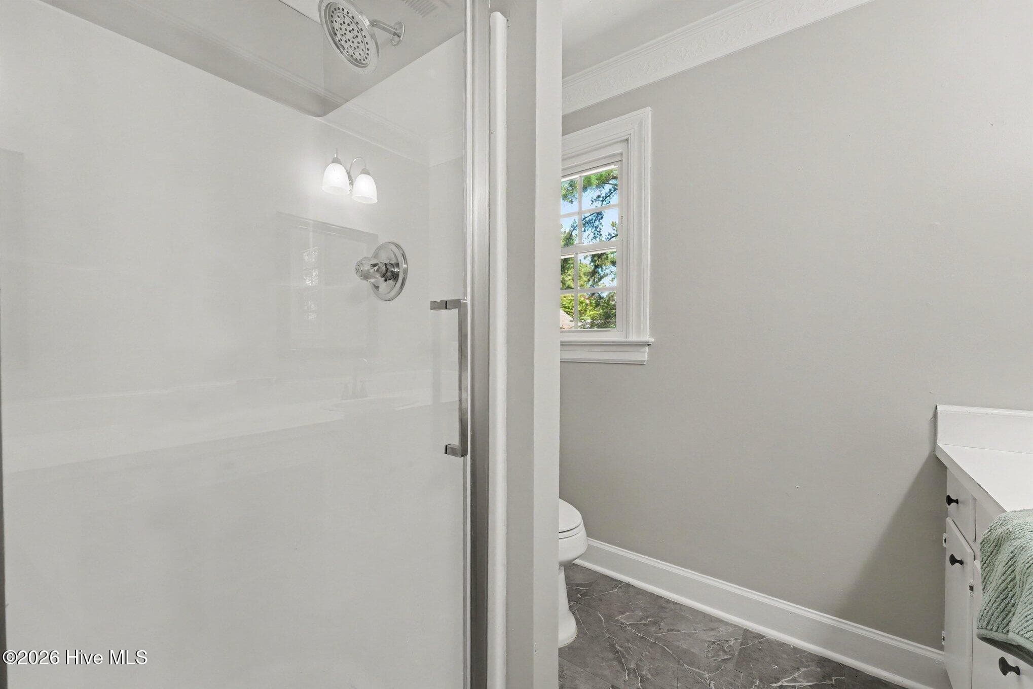 Master bath with walk in shower and door. - 2112 Burnside Drive NW, Wilson, NC 27896