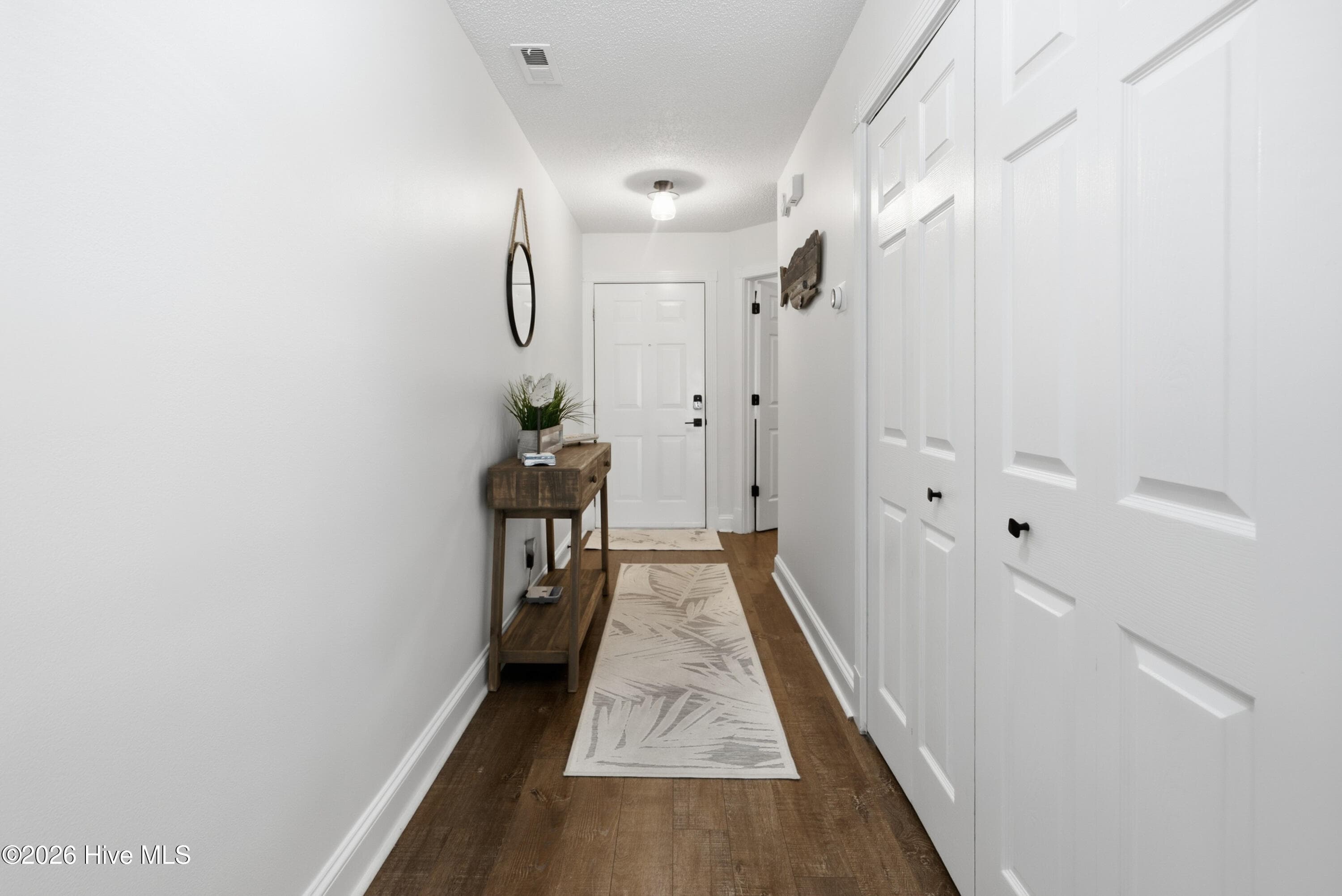 Beautiful Unit Entry & Utility Closet - 908 Resort Circle Unit 203, Sunset Beach, NC 28468