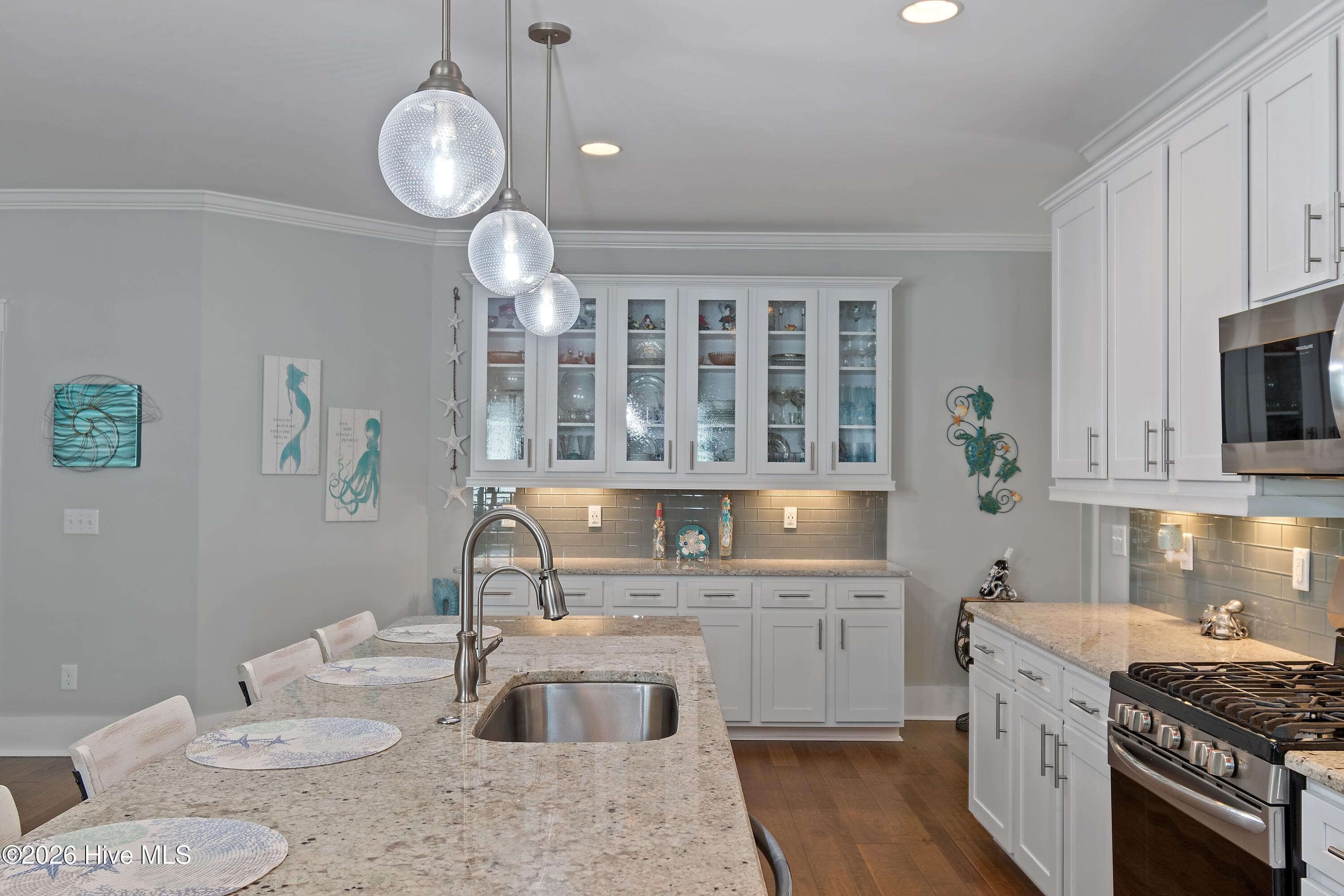 Notice the glass door cabinetry. - 6358 Bryson Drive SW, Ocean Isle Beach, NC 28469